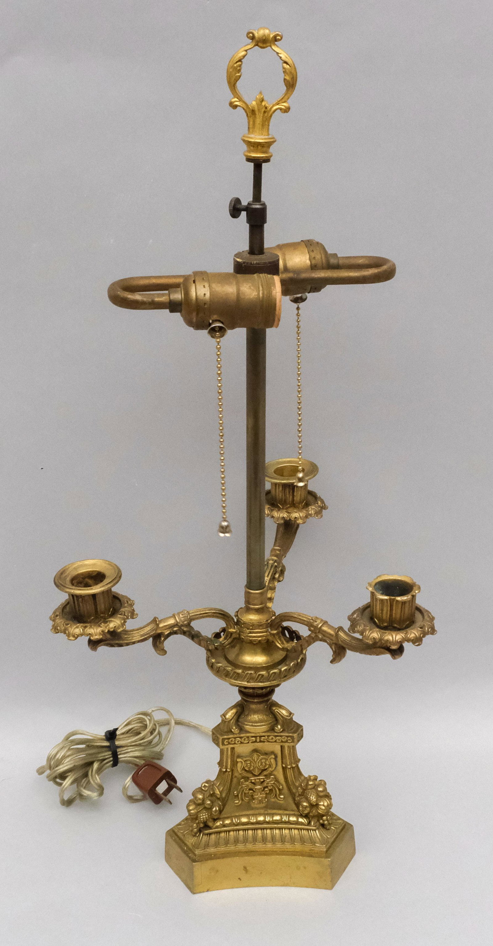 Gilt Metal Bouillotte Lamp: With bounties of fruit and 3 candelabra arms. 23" tall.
