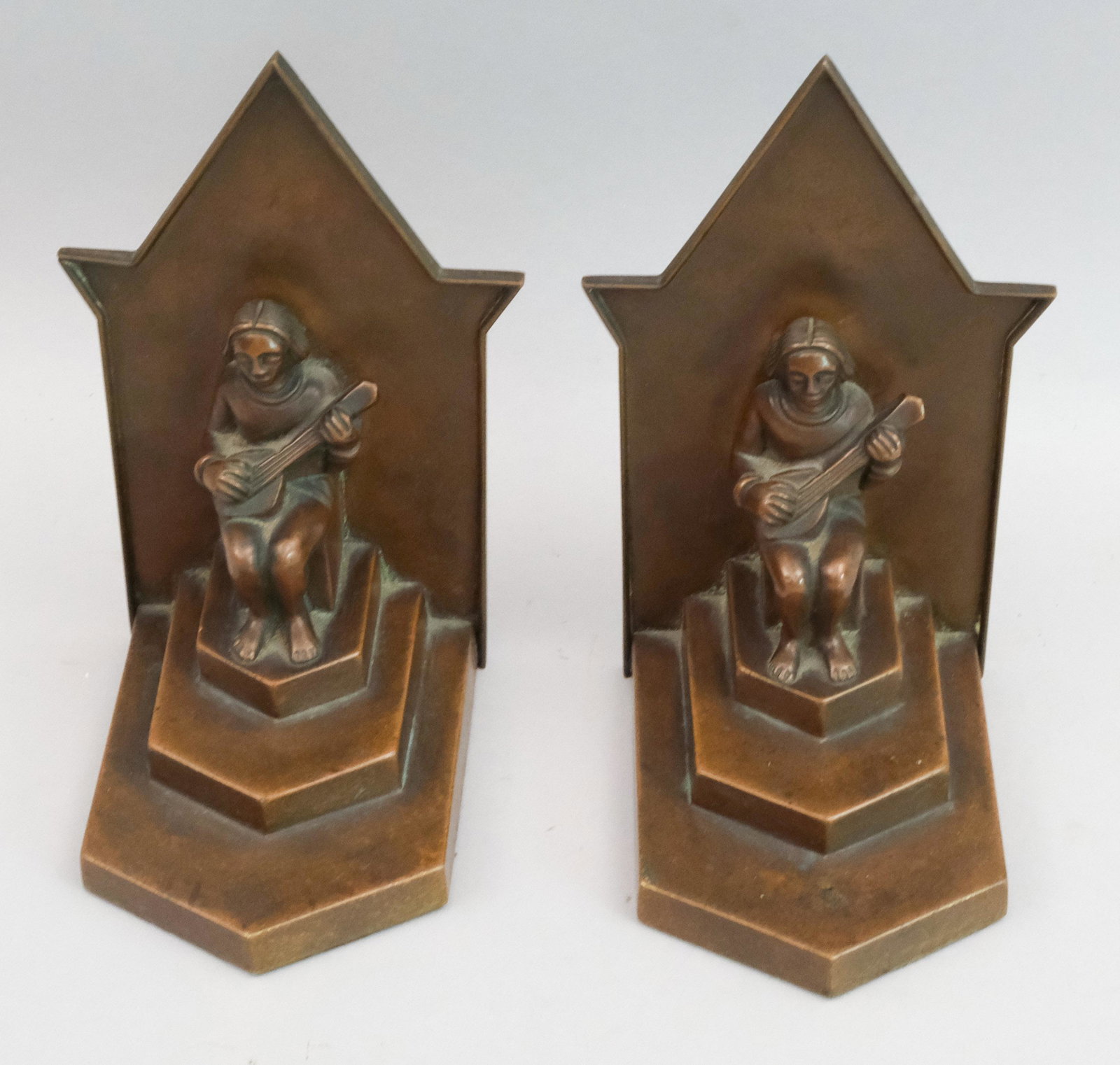 Neues Münchner Kunstgewerbe Bronze Bookends: New Munich Arts & Crafts of Germany. Art Deco geometric forms with seated musicians. Marked as shown. 7 1/2".