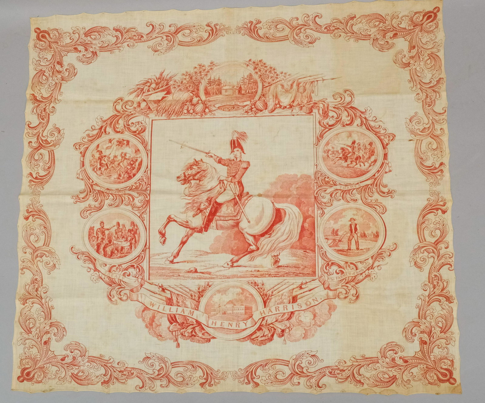Red William Henry Harrison Political Textile: Impressive commemorative print for "William Henry Harrison" in red on finely woven linen. Central image of Harrison on a white charger, surrounded by smaller vignettes of his life, from a log cabin in