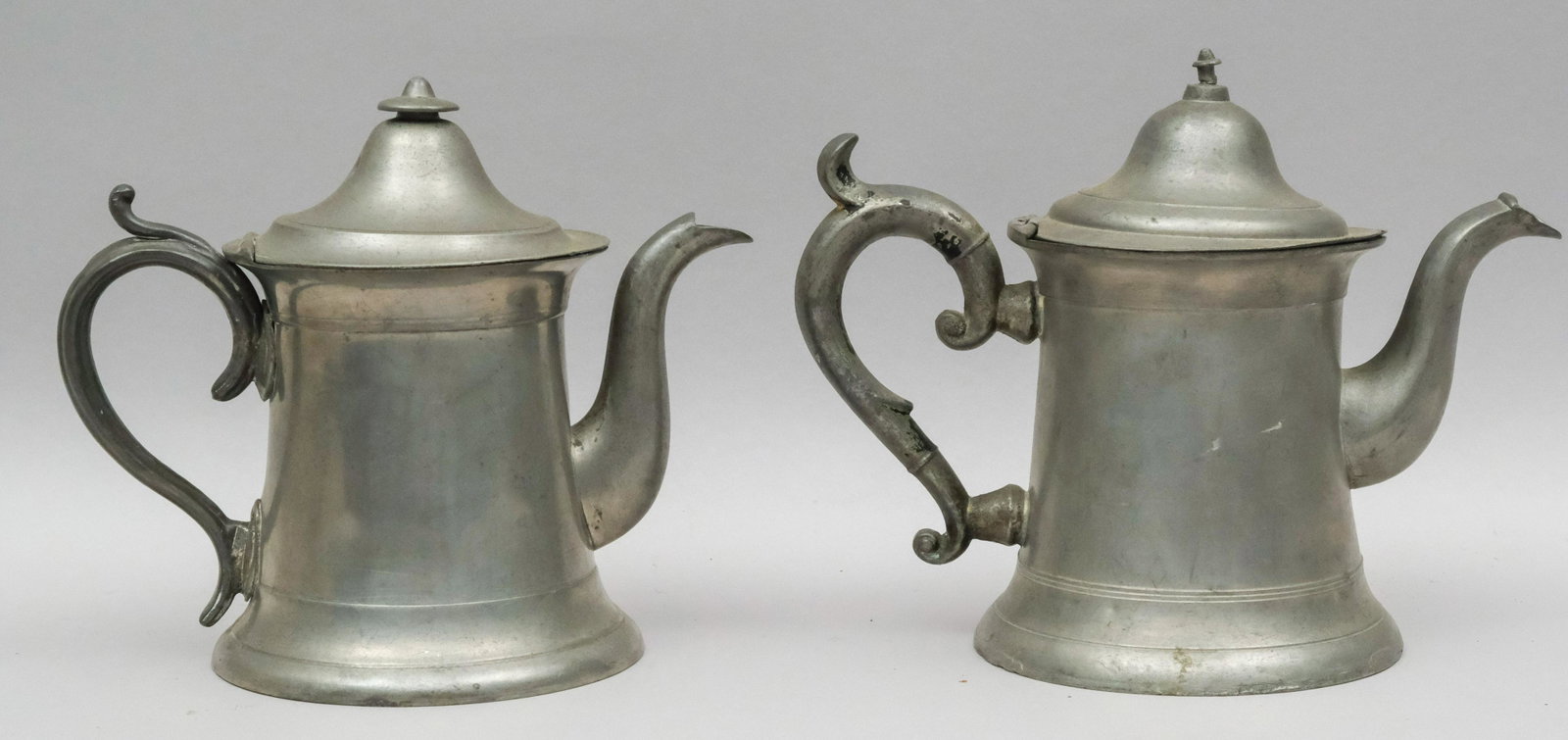 2 Antique American Pewter Teapots: One by F. Porter, the other R. Dunham. Marked as shown. 7 1/2" tall.