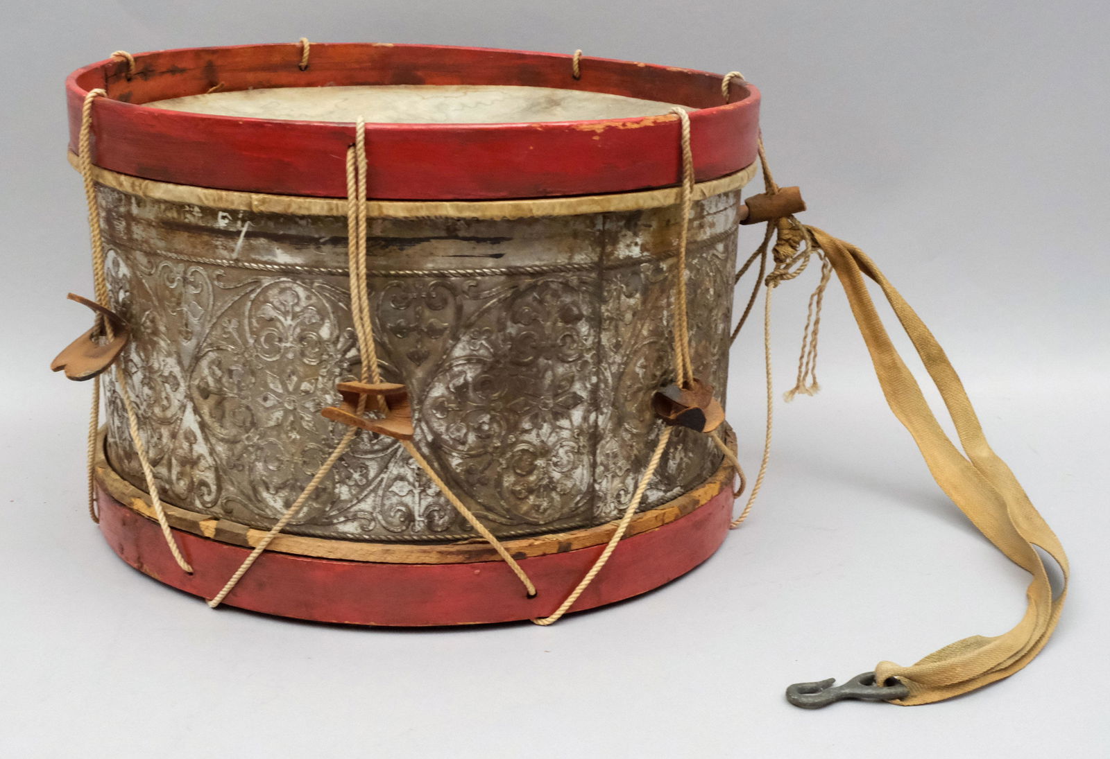 Columbian Exposition 1892 Snare Drum: With gilt metal decoration including a portrait of Christopher Columbus in profile. An interesting piece of World's Fair history. 7 3/4" x 12".