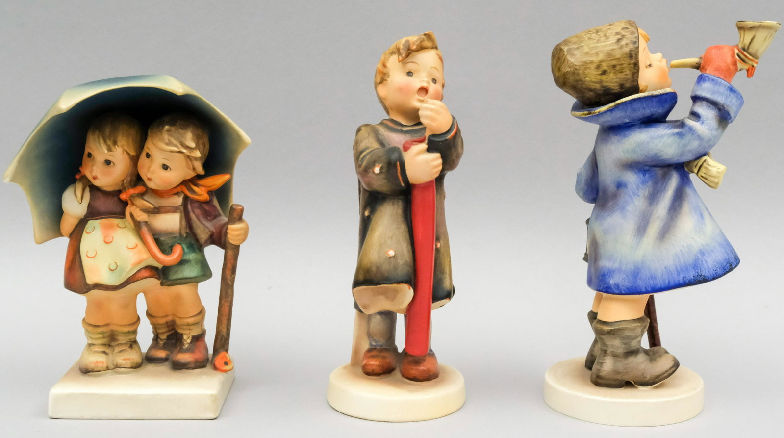 Lot of 3 Hummel Figurines: All marked as shown. Sizes from 6 1/4" to 7 1/2".