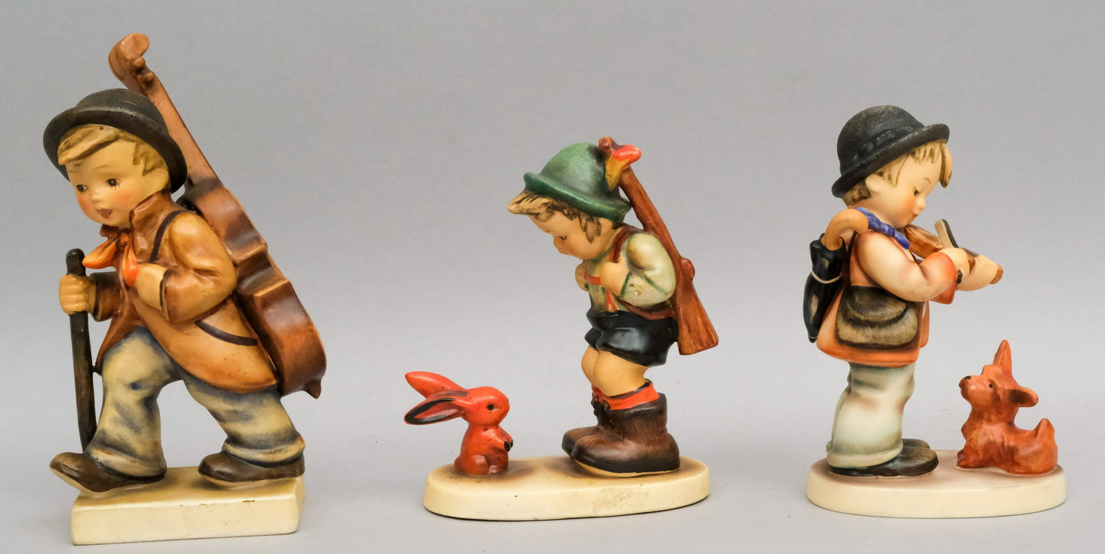 Lot of 3 Hummel Figurines: All marked as shown. Sizes from 3 1/2" to 6".