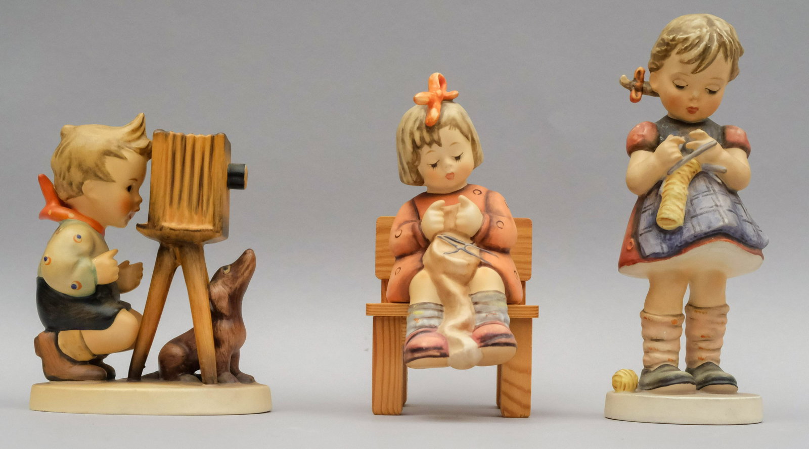 Lot of 3 Hummel Figurines: All marked as shown. Sizes from 5" to 6 3/4".