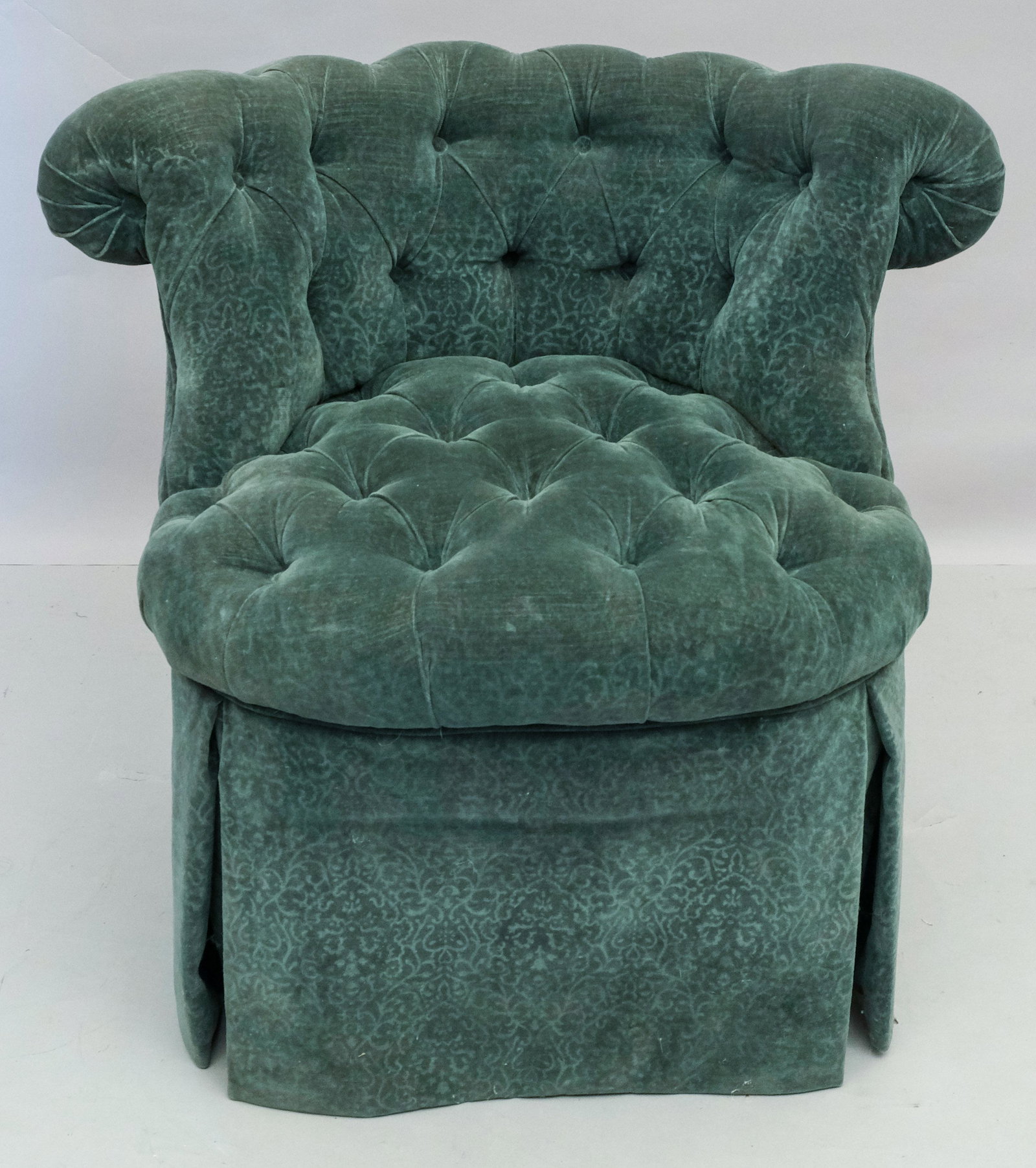 Green Tufted Upholstered Slipper Chair: With casters. Measuring 31" x 24" x 28".
