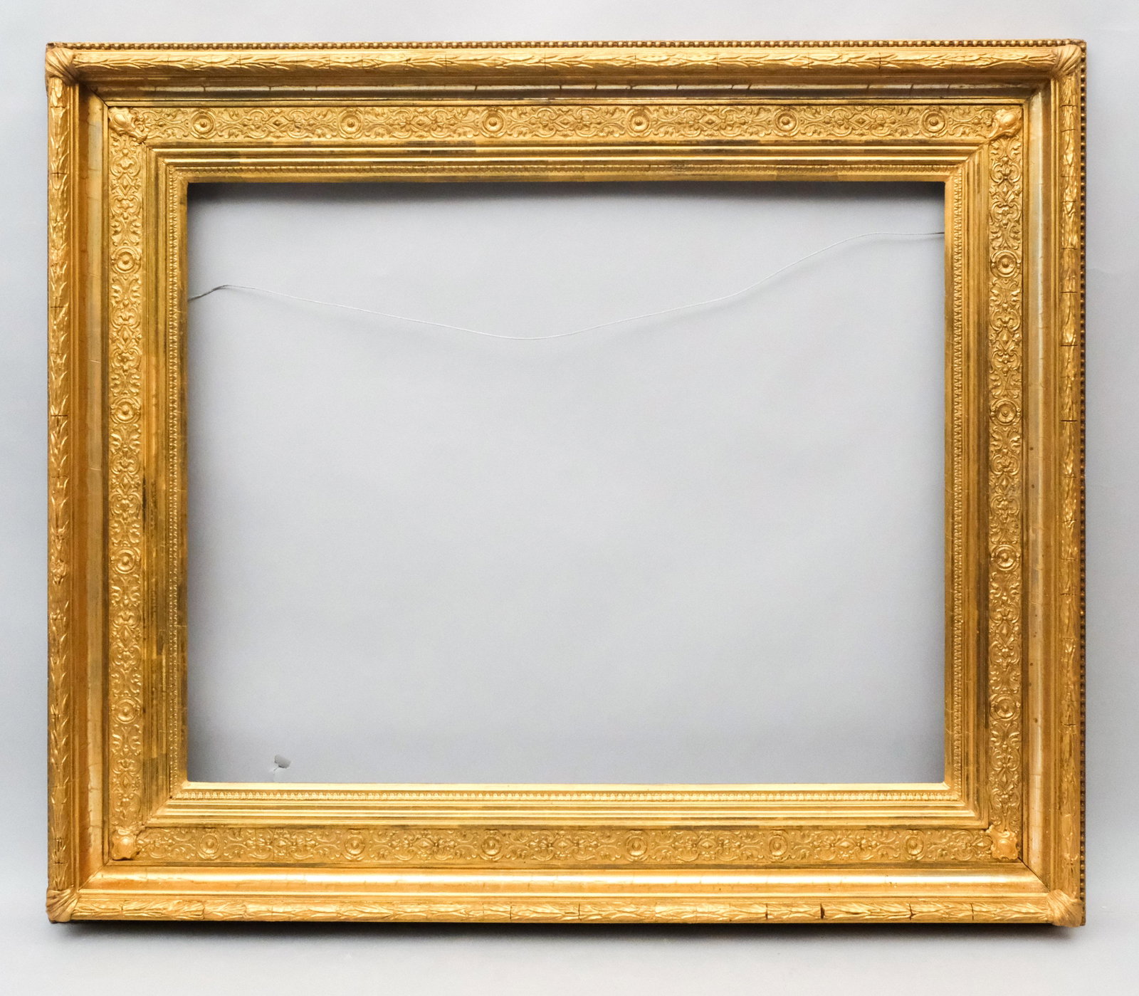 American Hudson River School Gifford Frame: American, ca. 1880, having laurel and berry top edge and gilt cove with panel liner of the style favored by Sanford Gifford. Rabbet: 33" X 26 1/4" Overall: 43 3/4" X 37 1/4" Molding Width: 7"