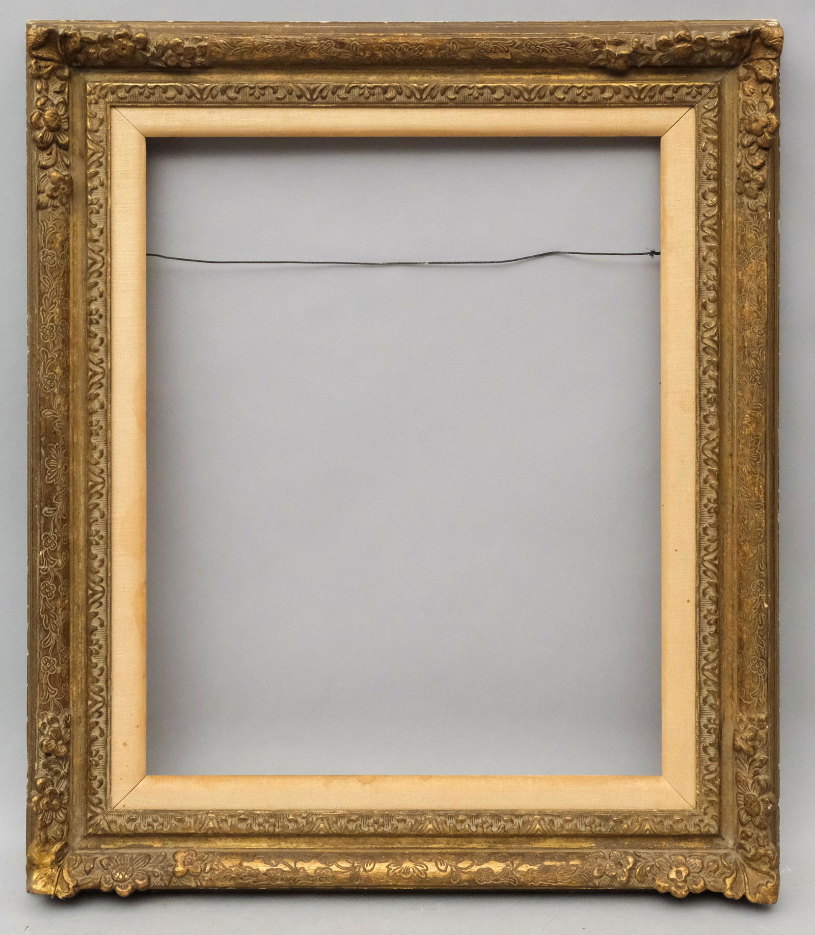 Louis XV Style Montparnasse Frame: House of Heydenryk, ca. 1940, having linen liner and gesso scumbled gilt incised surface. Overall: 28 3/4" X 24 3/4", Rabbet: 21 3/4" X 17 3/4", Molding Width: 4"
