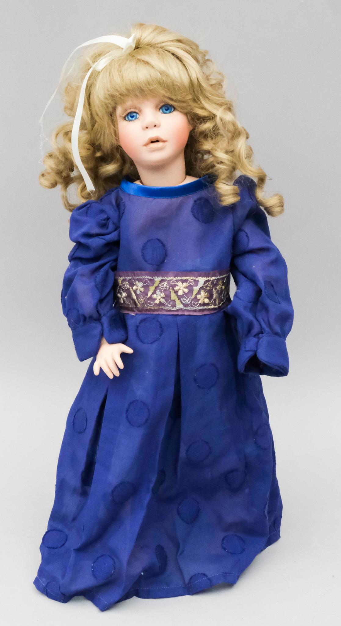 Janis Berard Limited Edition Porcelain Doll: Blue-eyed beauty in polka dot blue-on-blue dress. Marked as shown. 18 1/2".