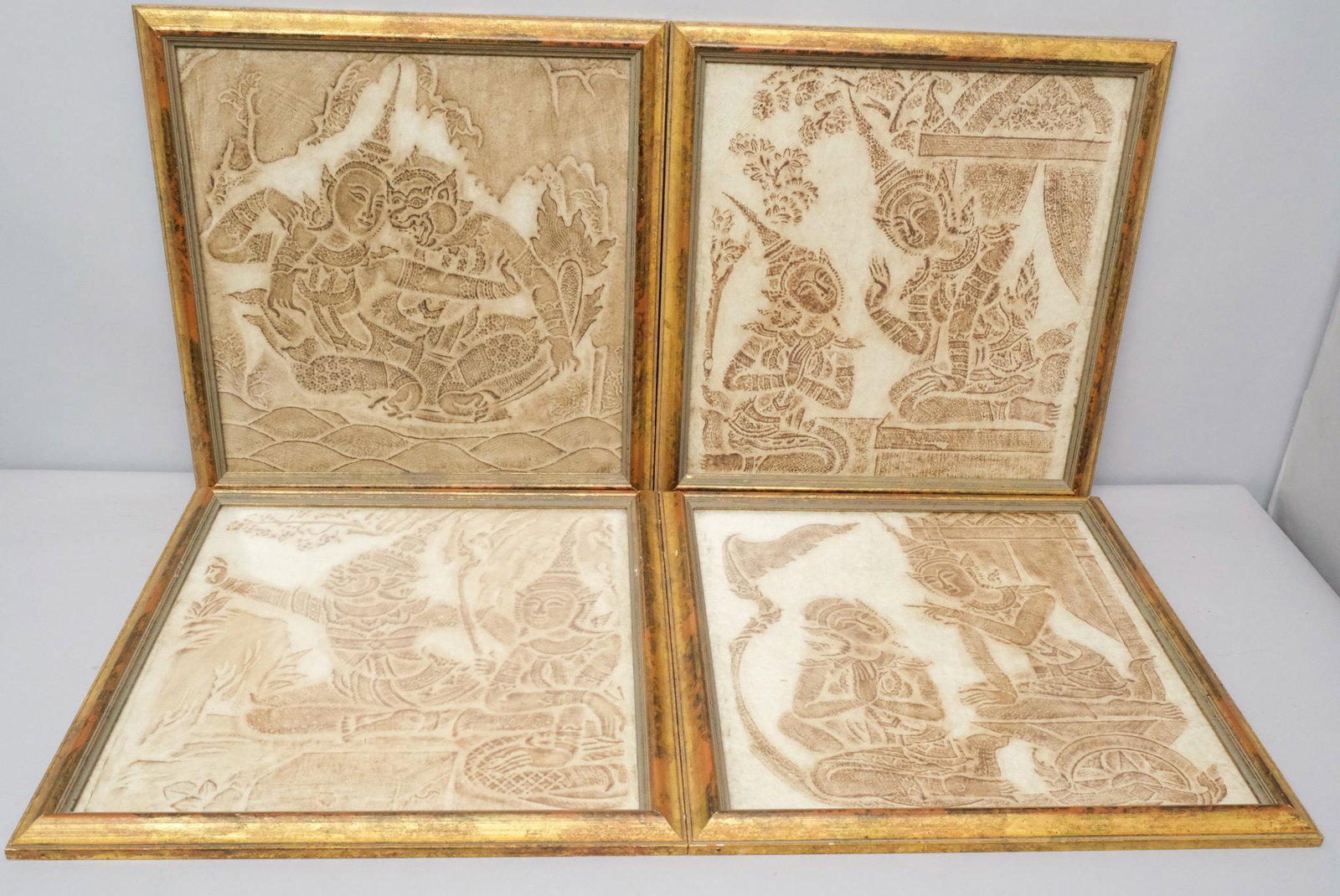 Group of Four Thai Temple Rubbings: Each in matching frames 18 3/4" x 19"