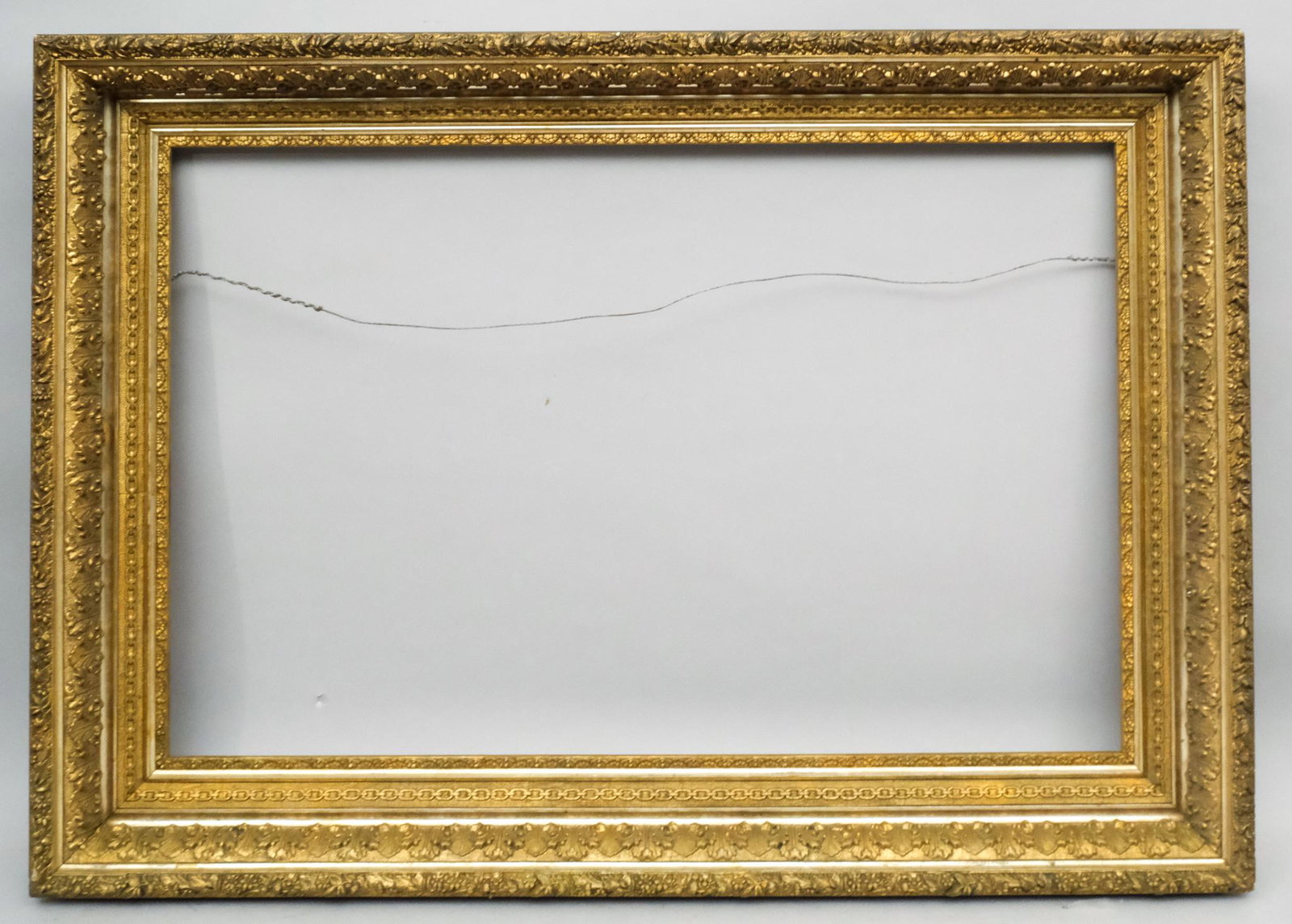 Hudson River School Frame: American, ca. 1870, having brightly gilded compo decoration. Rabbet: 22" x 34", overall: 29 1/2" x 41 1/2", molding: 4"