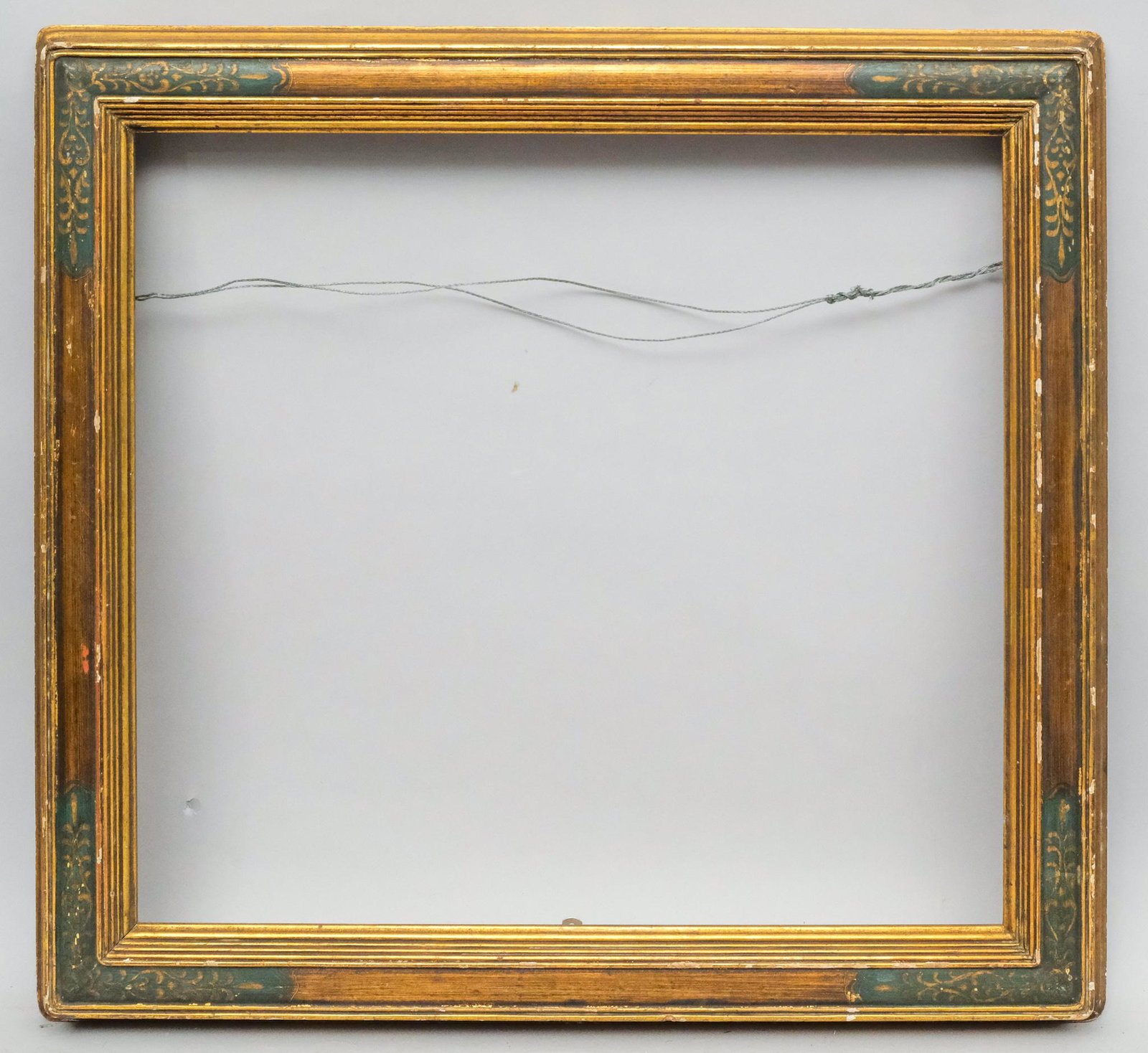 Newcomb Macklin Gilt and Polychrome Frame: American, ca. 1920. Rabbet: 20" x 22" Overall Dimensions: 25 1/2" x 27 1/2" Molding Width: 3".