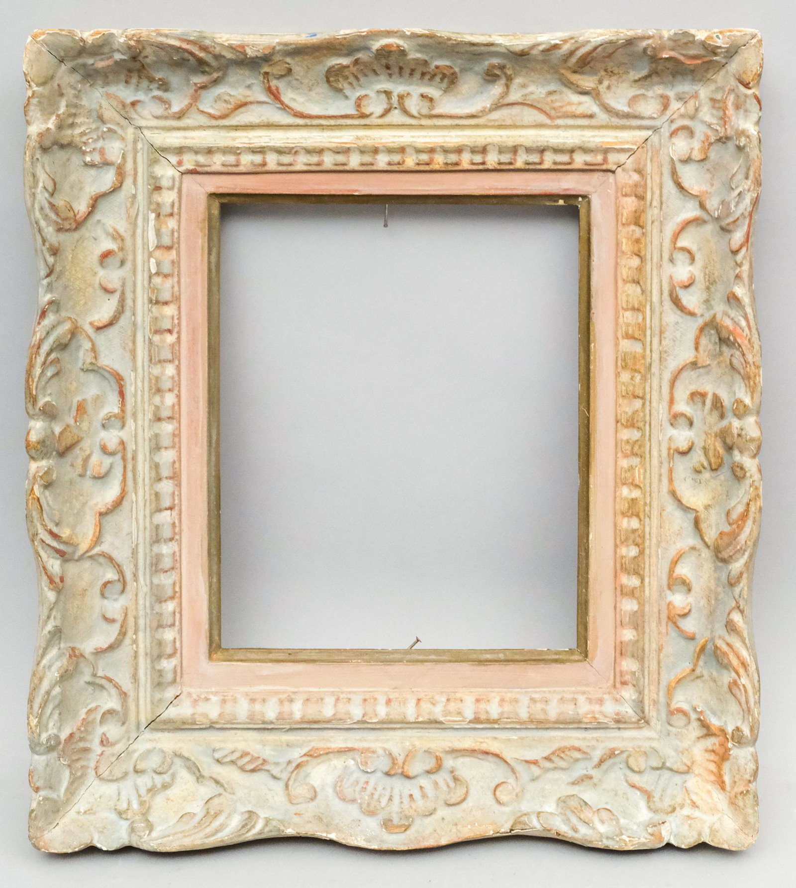 Louis XIV Style Montparnasse Frame: French, ca. 1930, hand carved and polychromed. One of a pair with Lot 225. Rabbet: 9" X 11" Overall: 16" X 18" Molding Width: 4"
