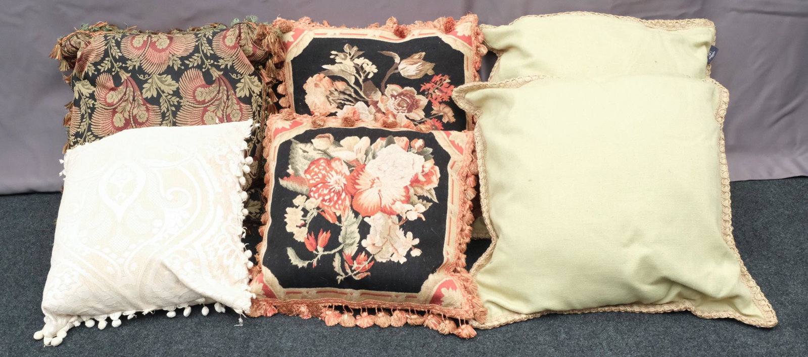 Large Lot of Decorative Vintage Throw Pillows: Upholstered in a variety of fabrics and executed in a variety of styles, some with tassels.