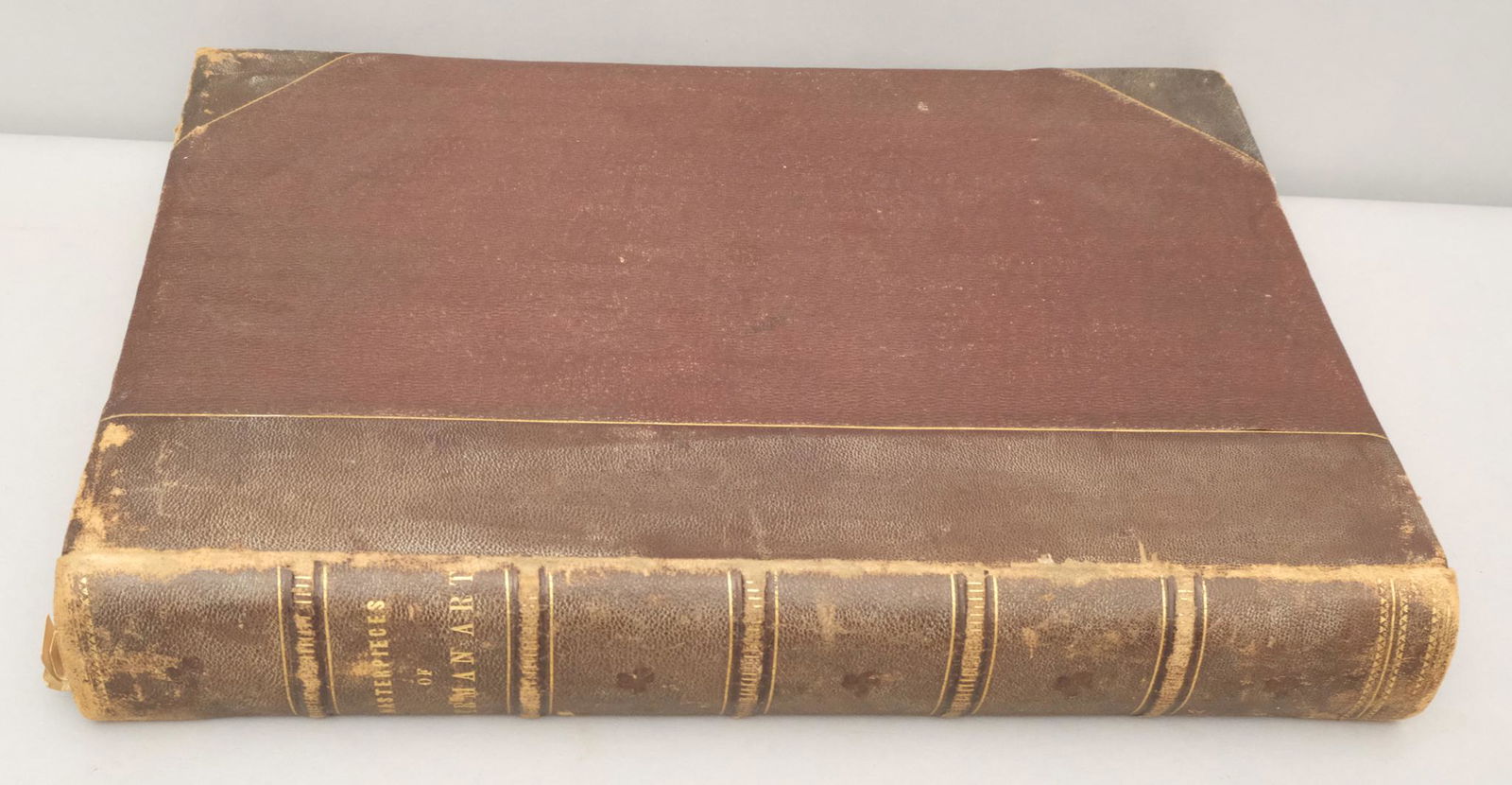 Large Leather Book, "Masterpieces of German Art": Large bound volume with gilt edged pages and full photogravures of various masterworks of the German artists. Measuring 12 1/4" x 17"