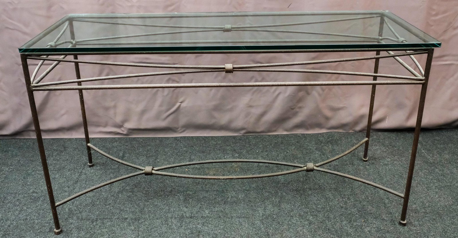 Glass Top Metal Side Table: Contemporary metal garden table with glass top, well built and sturdy Measures:18" x 51 3/4" x 28 1/4".
