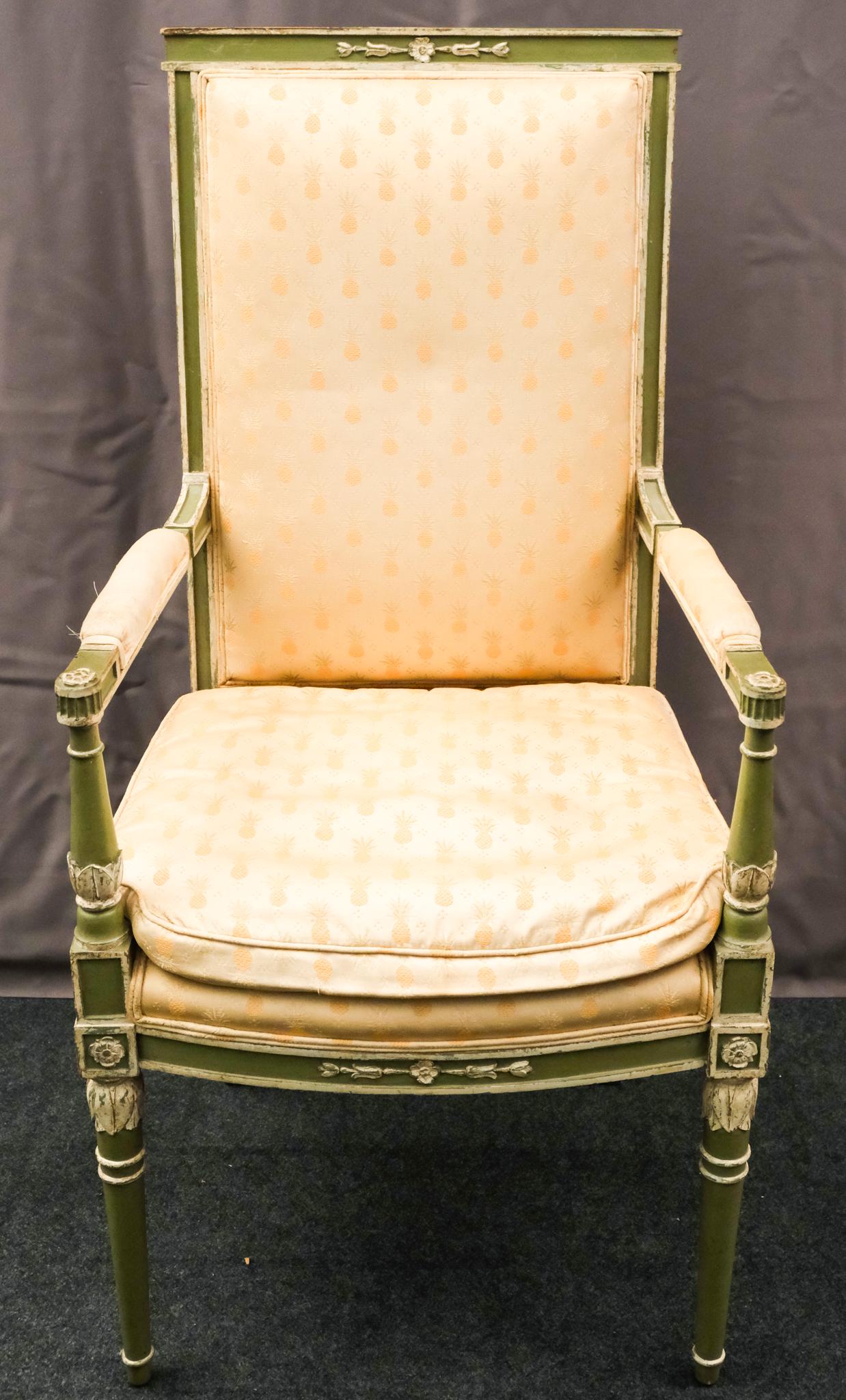 French Style Carved and Painted Armchair: French style painted and carved armchair with pineapple upholstery and carved rosettes.18" X 21 1/2" X 44"