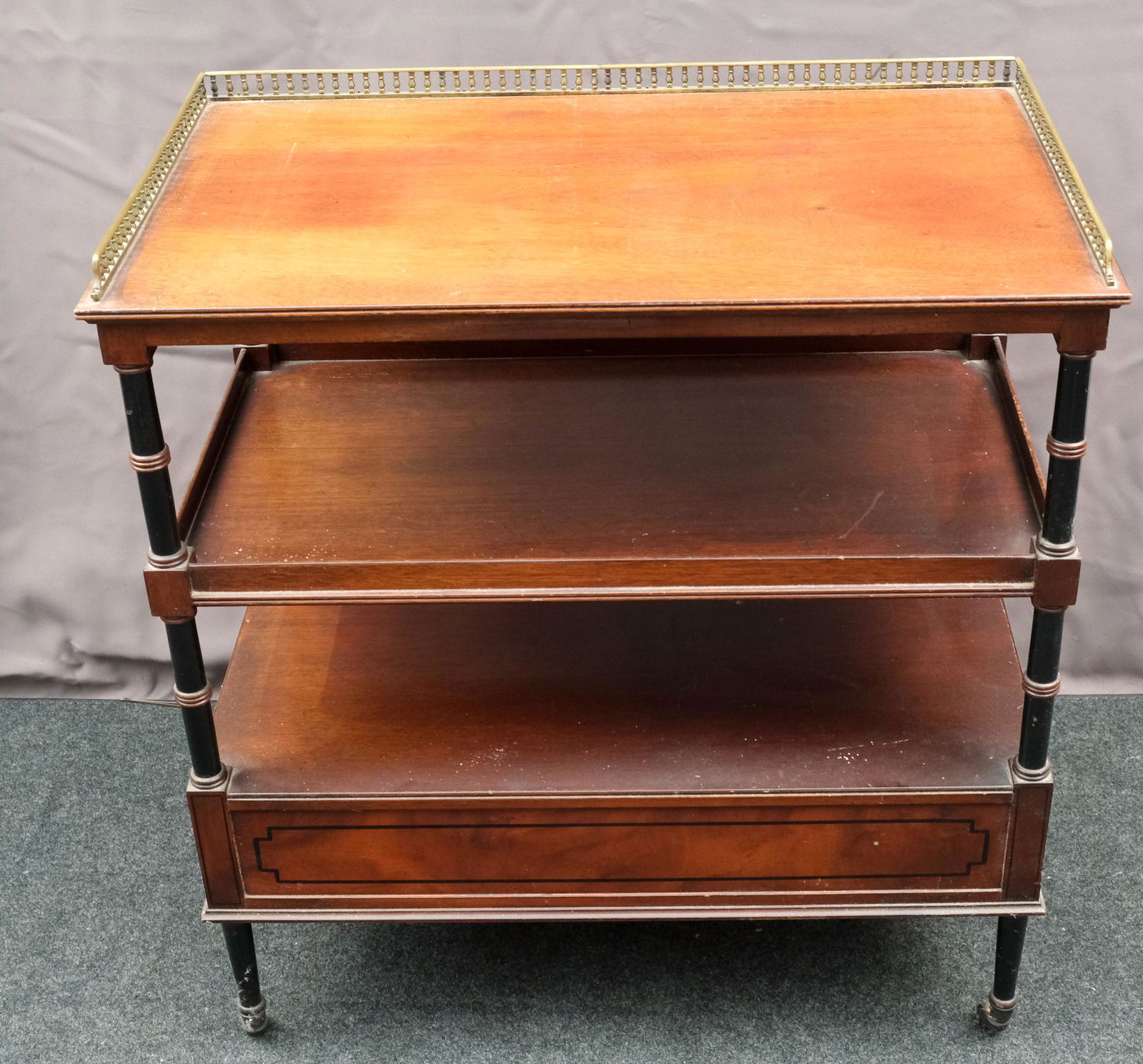 Beacon Hill Collection Regency Style Side Table: Beacon Hill Collection Regency style mahogany side table or cart with brass lion head pulls on double ended drawer, brass gallery and on casters. 15 1/2" D x 27" W x 29 1/2" H