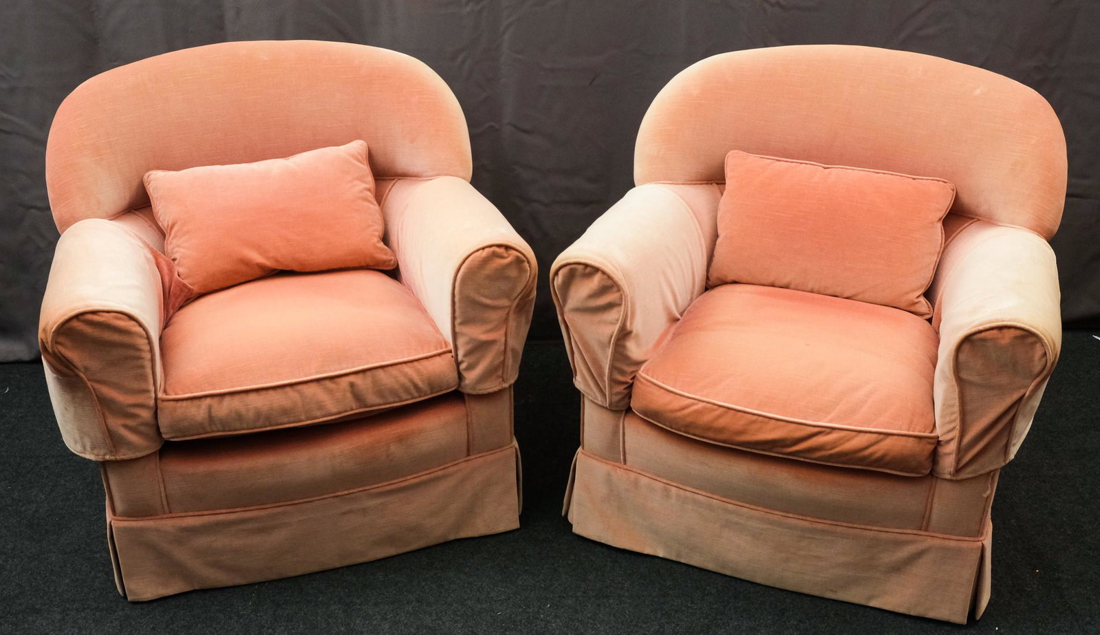 Pair of Pale Pink Velvet Club Chairs: Pair of faded rose to gold cotton velvet club chairs with rectangular back pillows and arm slipcovers. A very comfortable and handsome set. 33" W X 27" D X 32" H