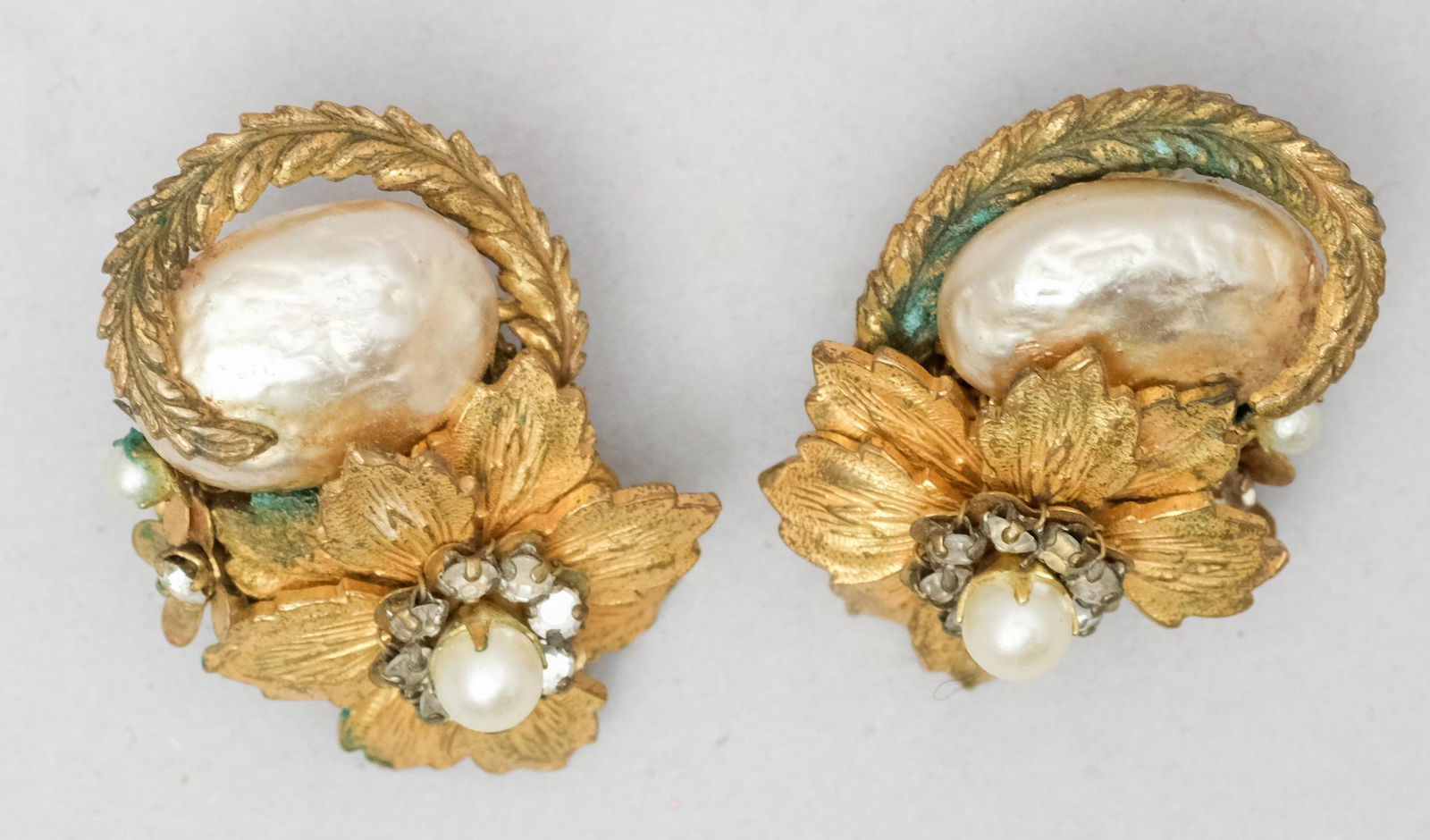 Pair Floral Faux Pearl Miriam Haskell Earrings: With rhinestones and faux pearls. Marked as shown. 1 1/2".