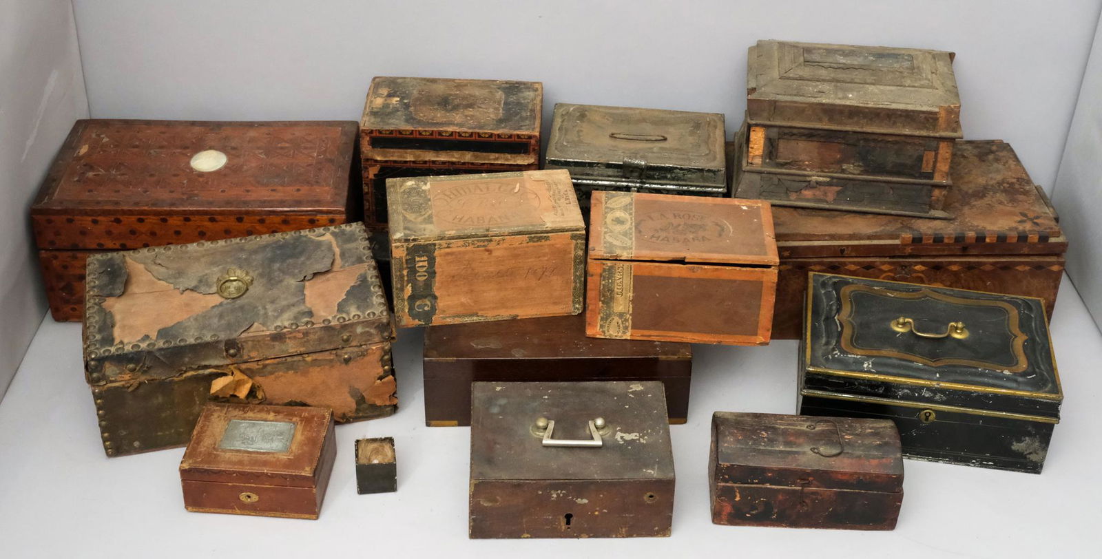 Large Group of Antique Decorative Boxes: Comprising a multitude of media and materials including a Tunbridge Wells box with carved mother of pearl medallion of William Shakespeare, some tole paint money boxes, several decoupage examples, and