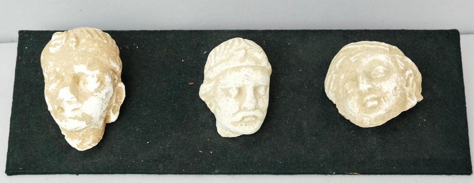 Three Mounted Heads In a Box (1 of 7)