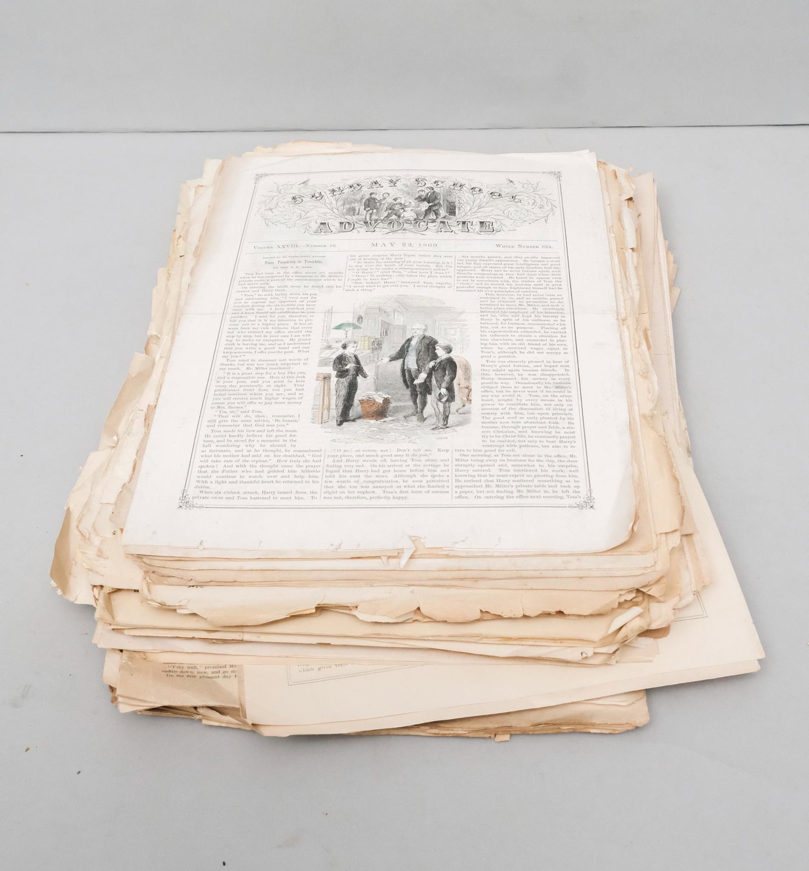Newspaper Lot 1850s - 1870s: Large lot of newspapers from the 1850s - 1870s including the Sunday School Advocate, The Ladies Home Journal, Daily American Organ, and others. Stack measures approx. 12” X 18” X 3”.