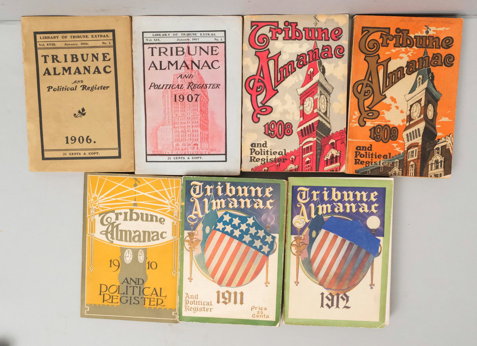 Tribune Almanacs 1907 - 1912: The Tribune Almanac for the years 1907, 1908, 1909, 1910, 1911, and 1912. Published by the Tribune Association, New York. All are presented with their original illustrated paper covers, and contain a 