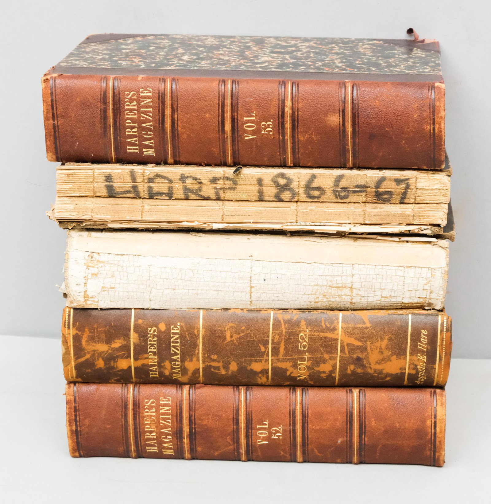 Harper's Magazine, 5 Volumes, 1800s: This lot contains (5) volumes of Harper's Magazine: Volume 34, 1867. Notable cover plate of Wild Bill Hickock included. Covers separated, missing spine, loose binding, some pages missing at end. <