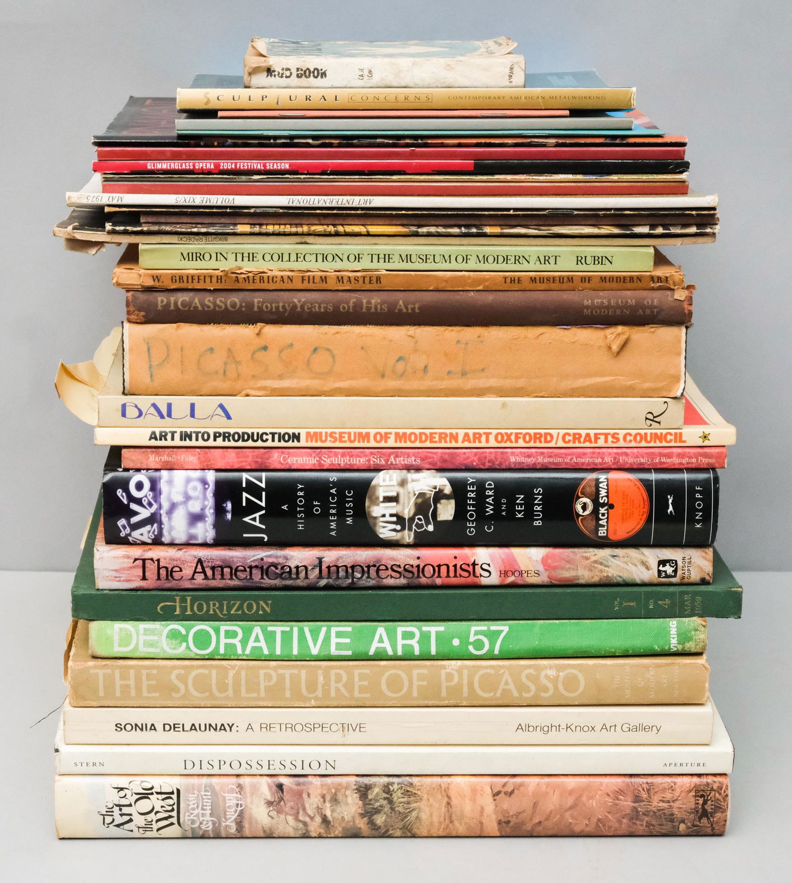 Art / Coffee Table Books: Large lot of art books, gallery catalogs, and coffee table books. Picasso, Miro, John Cage, Jazz, art of the old west, and more. Together measuring approx. 12" X 14" X 16". Condition varies, most in g