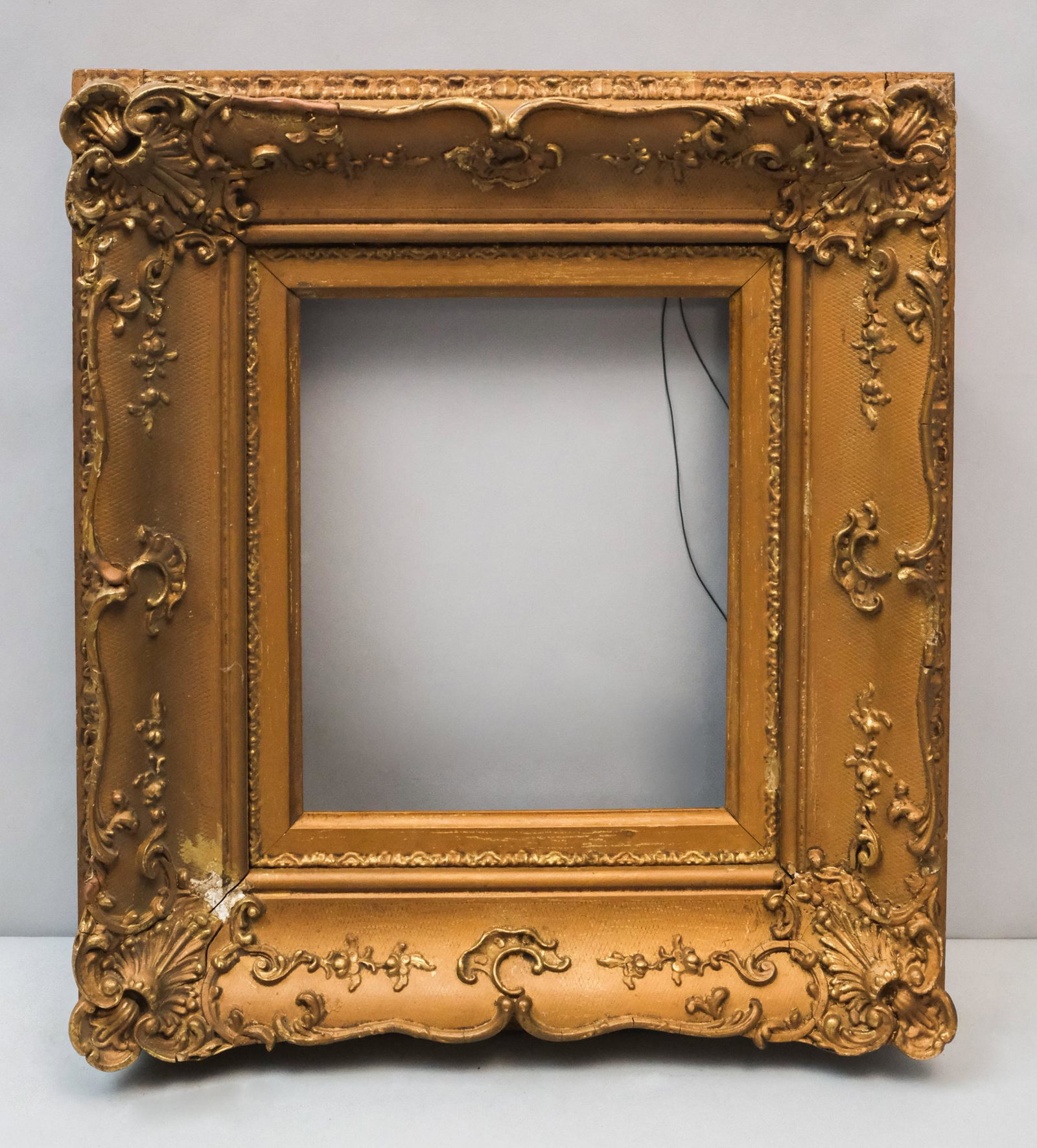 American Baroque Revival Frame: American, ca. 1840, in a great standard size. Rabbet 10" X 12" overall 19" X 21" molding width 2 7/8"