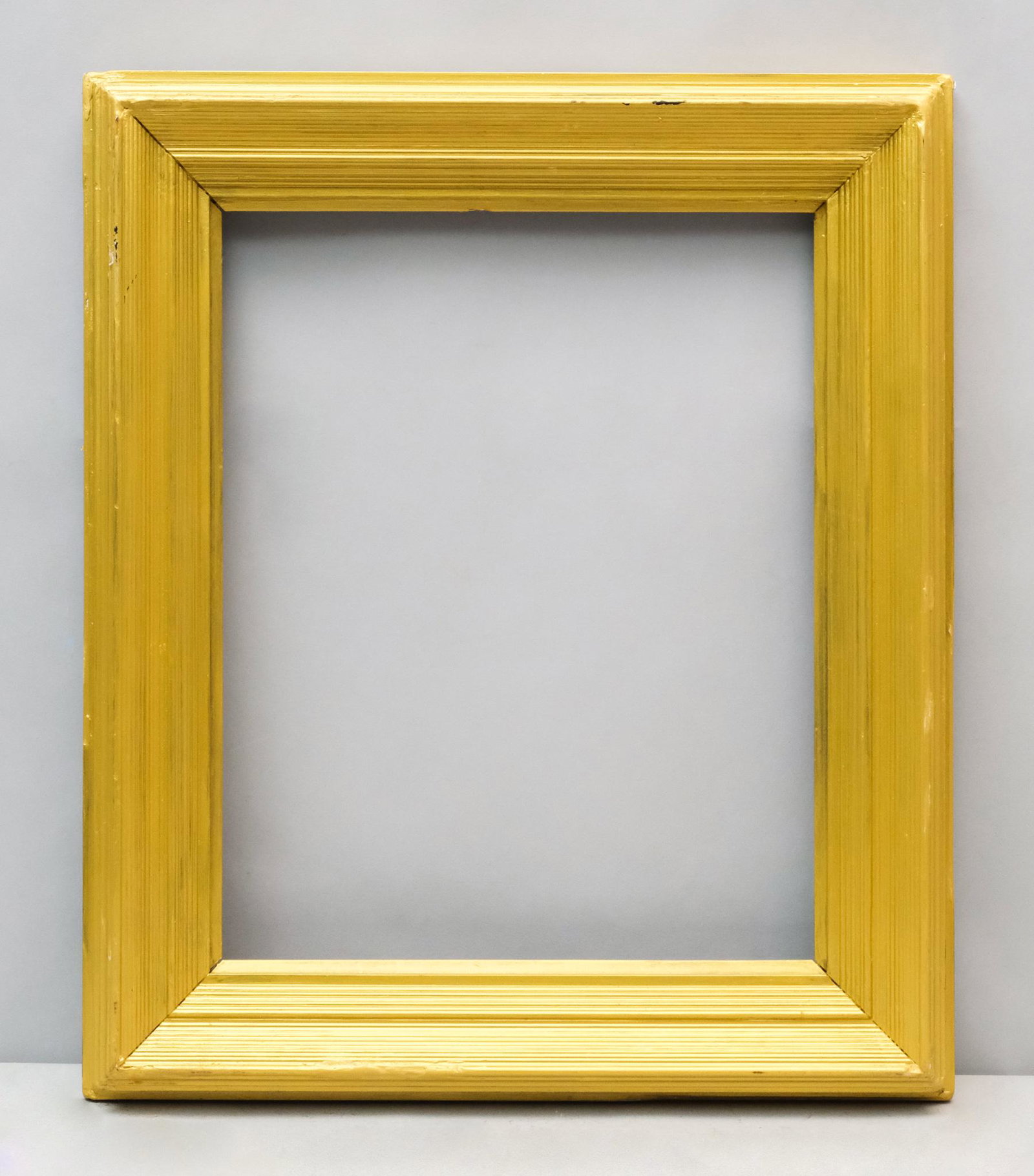 American Whistler Gilt Frame: American, ca. 1900, likely made by Foster Bros., having complex reeded profile. Overall 18 1/4" X 21 1/2", Rabbet 13" X 16 1/4", Molding 3"