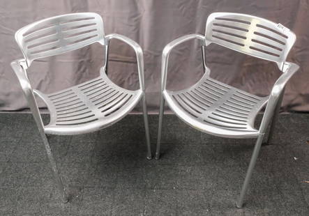 Pair of Jorge Pensi "Toledo" Chairs: Pair of Jorge Pensi for Amat (for Knoll) cast-aluminum "Toledo" stacking chairs, stamped "Toledo Design Jorge Pensi for Amat, Made in Spain" on the bottom, circa 1986, 30 1/2" H x 22" W x 21" D.