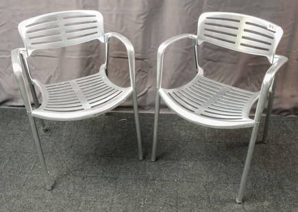 Pair of Jorge Pensi "Toledo" Chairs: Pair of Jorge Pensi for Amat (for Knoll) cast-aluminum "Toledo" stacking chairs, stamped "Toledo Design Jorge Pensi for Amat, Made in Spain" on the bottom, circa 1986, 30 1/2" H x 22" W x 21" D.