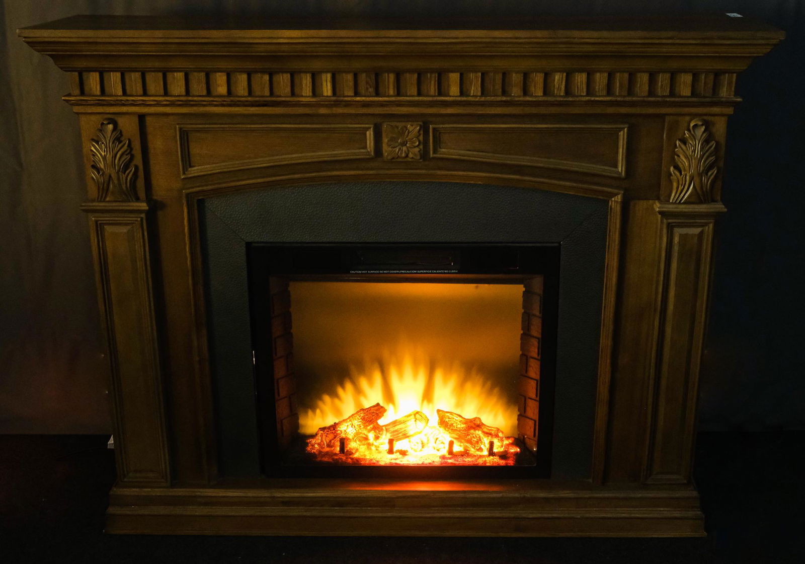 Electric Fireplace with Carved Wooden Mantle (1 of 10)