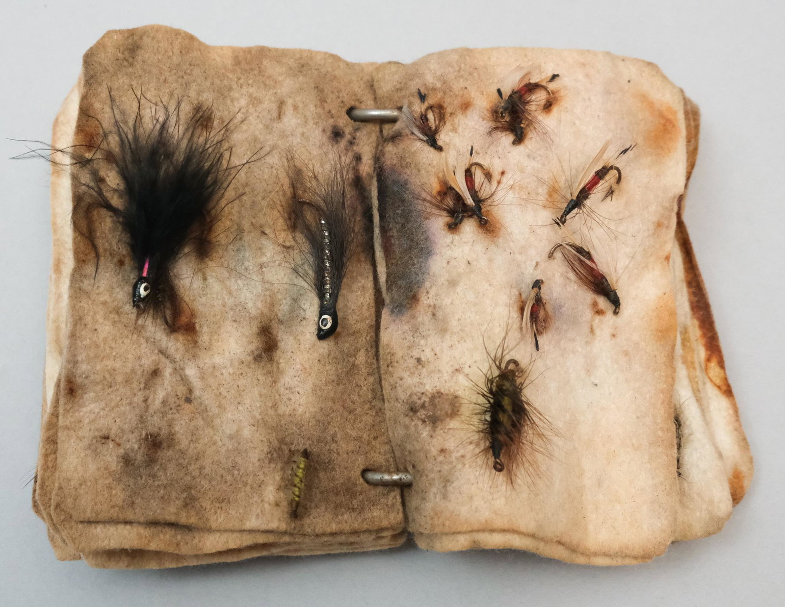 Antique Felt Book of Fly Tie FIshing Lures: Charming and extensive assortment of lures using many different feathers and furs.