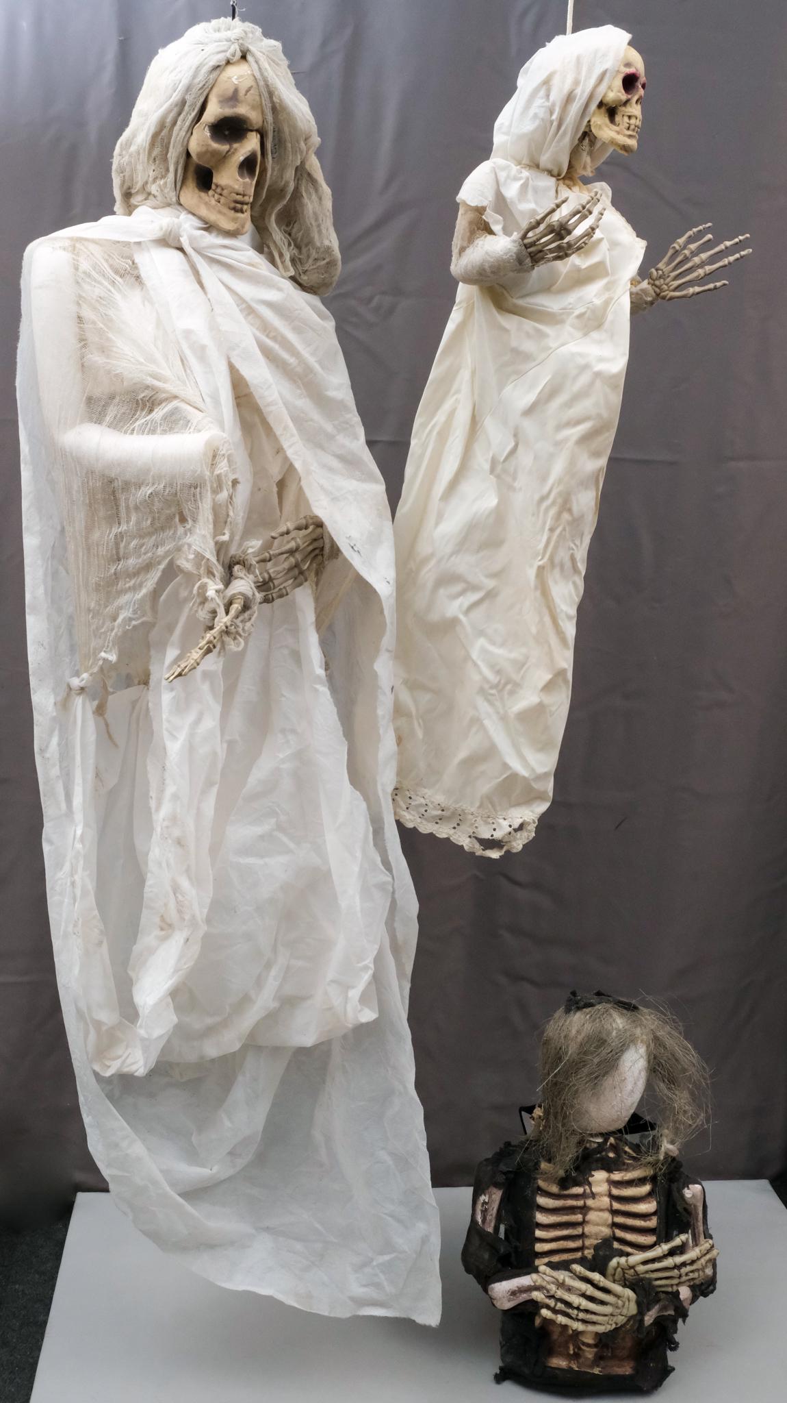 Vintage Lot of Halloween Decorations: Creepy skeletons in tattered rags.