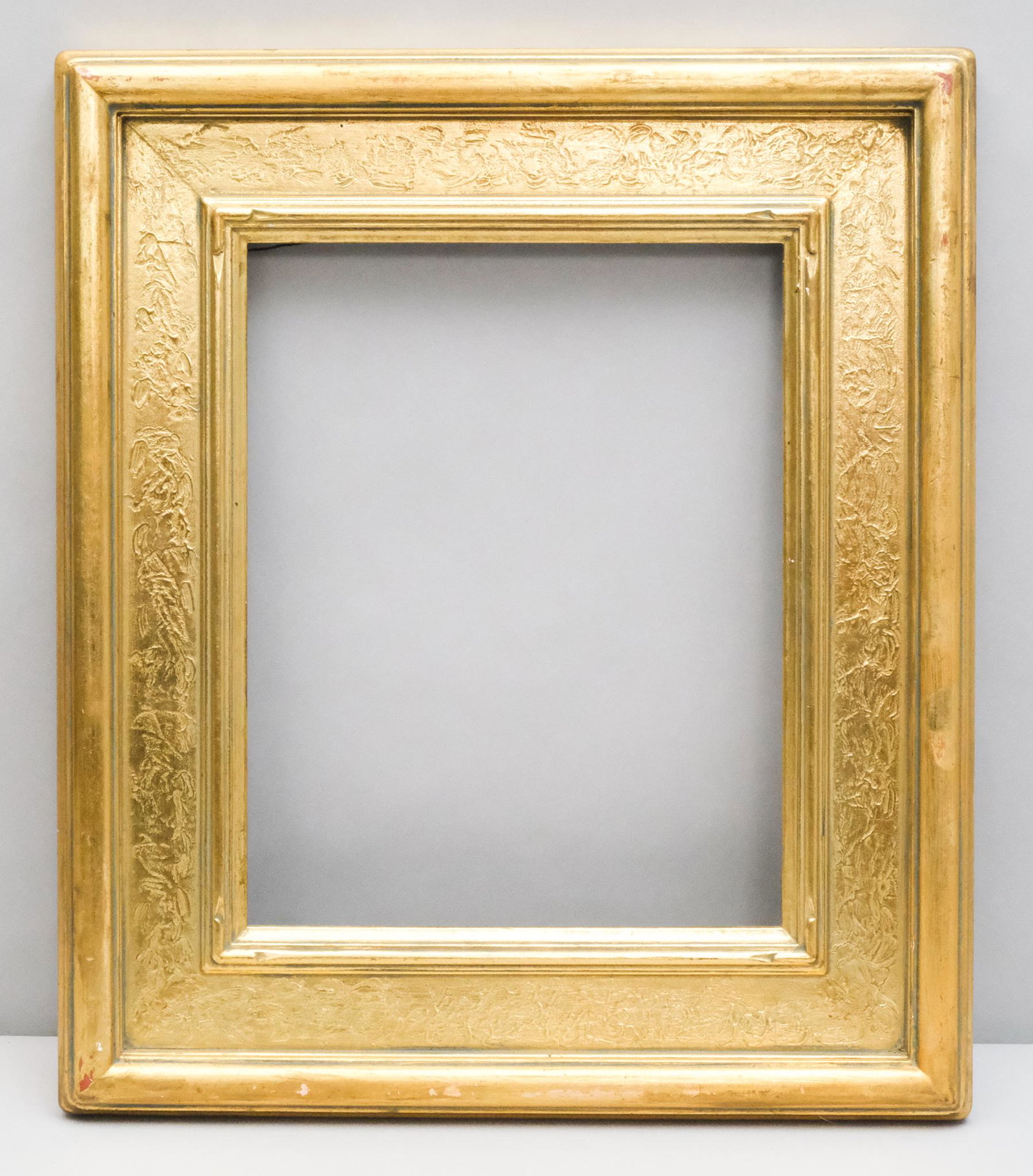 Arts & Crafts Gilt Cassetta Frame: American, circa 1920, hand carved and gilded cassetta frame in the Hassam style. Overall 18 1/4" x 21 1/4", Rabbet 11" x 14", Molding 3 3/4"
