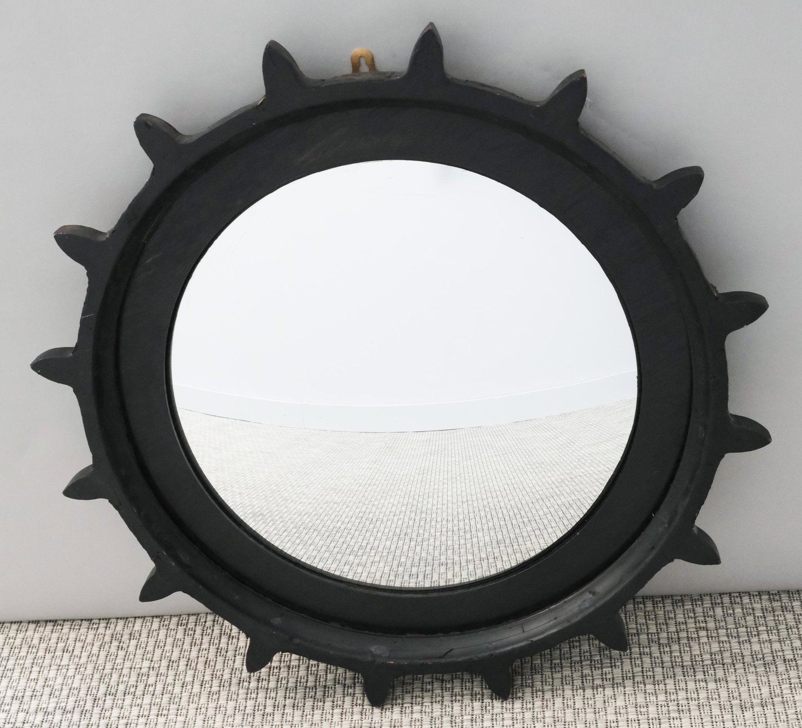 Mid-Century Convex Mirror: Mid-century carved wooden mirror with convex glass, 26 1/2" diameter.
