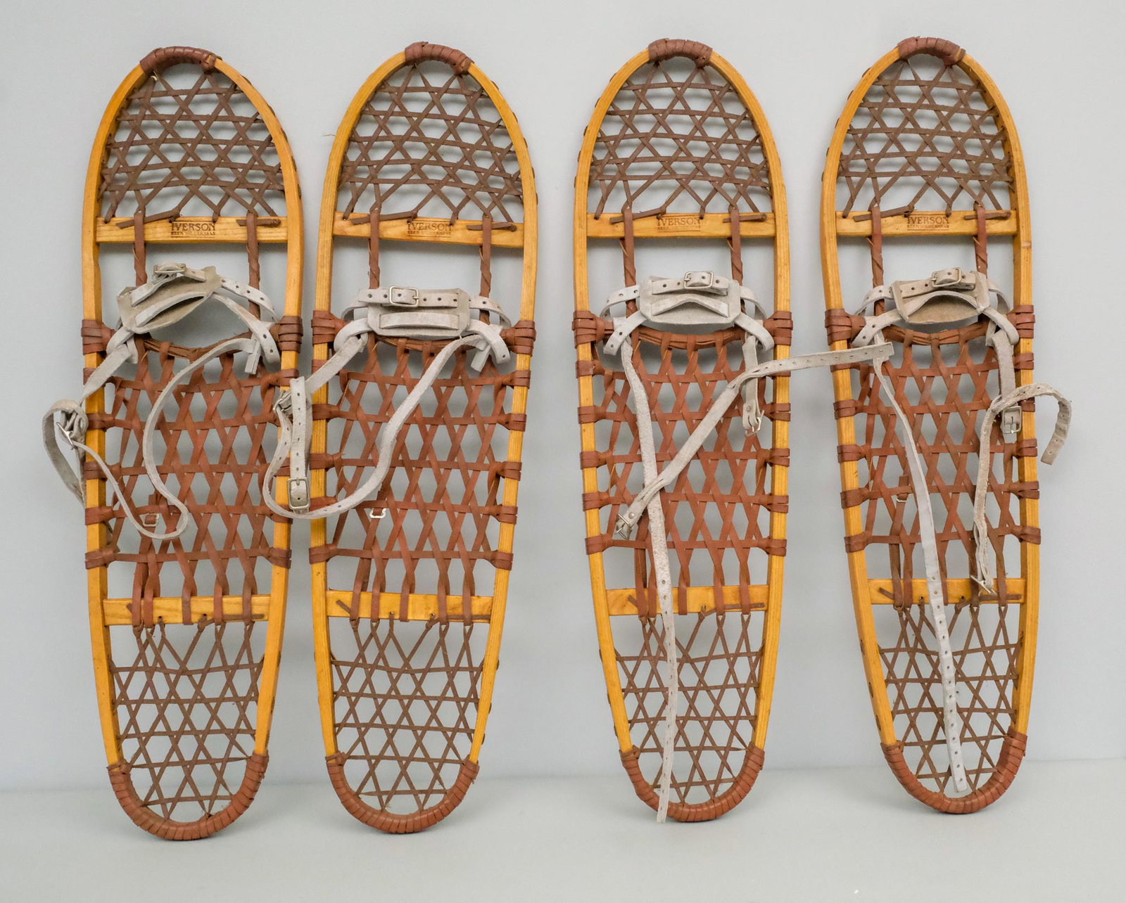 Two Pairs of Iverson "Green Mountain" Snowshoes: Two Pairs of Iverson "Green Mountain" 10" x 30" snowshoes with gray leather "H" bindings. The rounded heel on this model allows for excellent maneuverability in any conditions from the trail to brushy