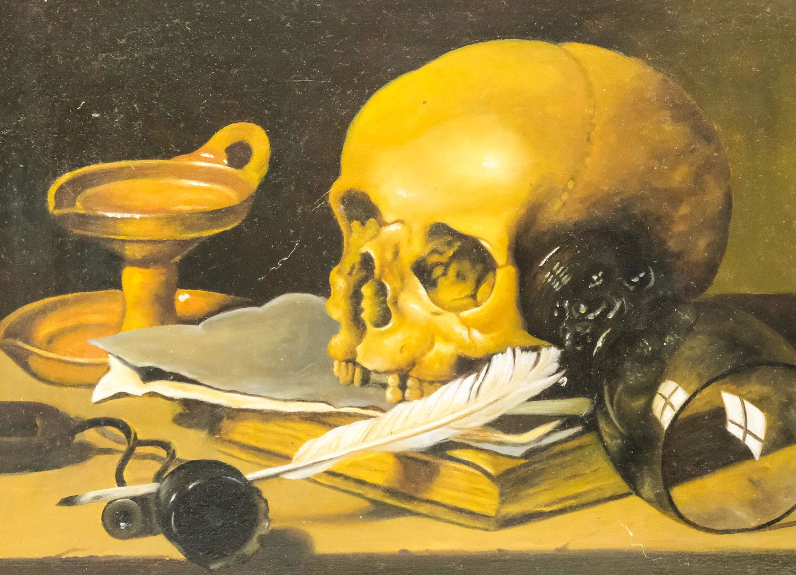 After Pieter Claesz, Vanitas Still Life: After Pieter Claesz (Dutch, 1597-1661), oil on wooden panel depicting a vanitas still life with skull, glass goblet, and quill, 9" x 11 3/4" panel, 11 3/4" x 14 3/4" framed.