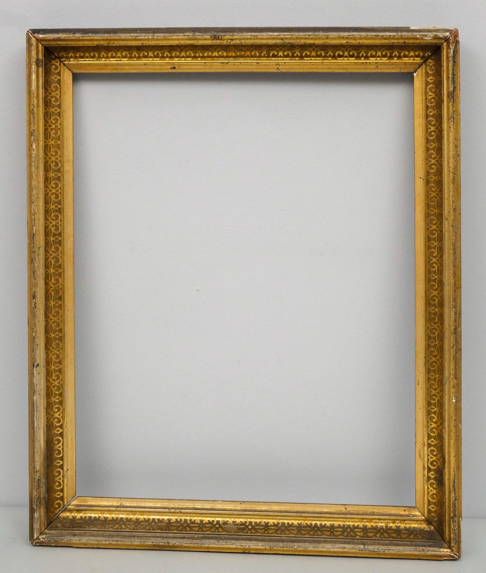 American Stenciled Lemon Gold Frame: American, circa 1860, with stenciled cove, in a great standard size, 19" x 23 1/4" overall, 16" x 20" rabbet, 2" molding.
