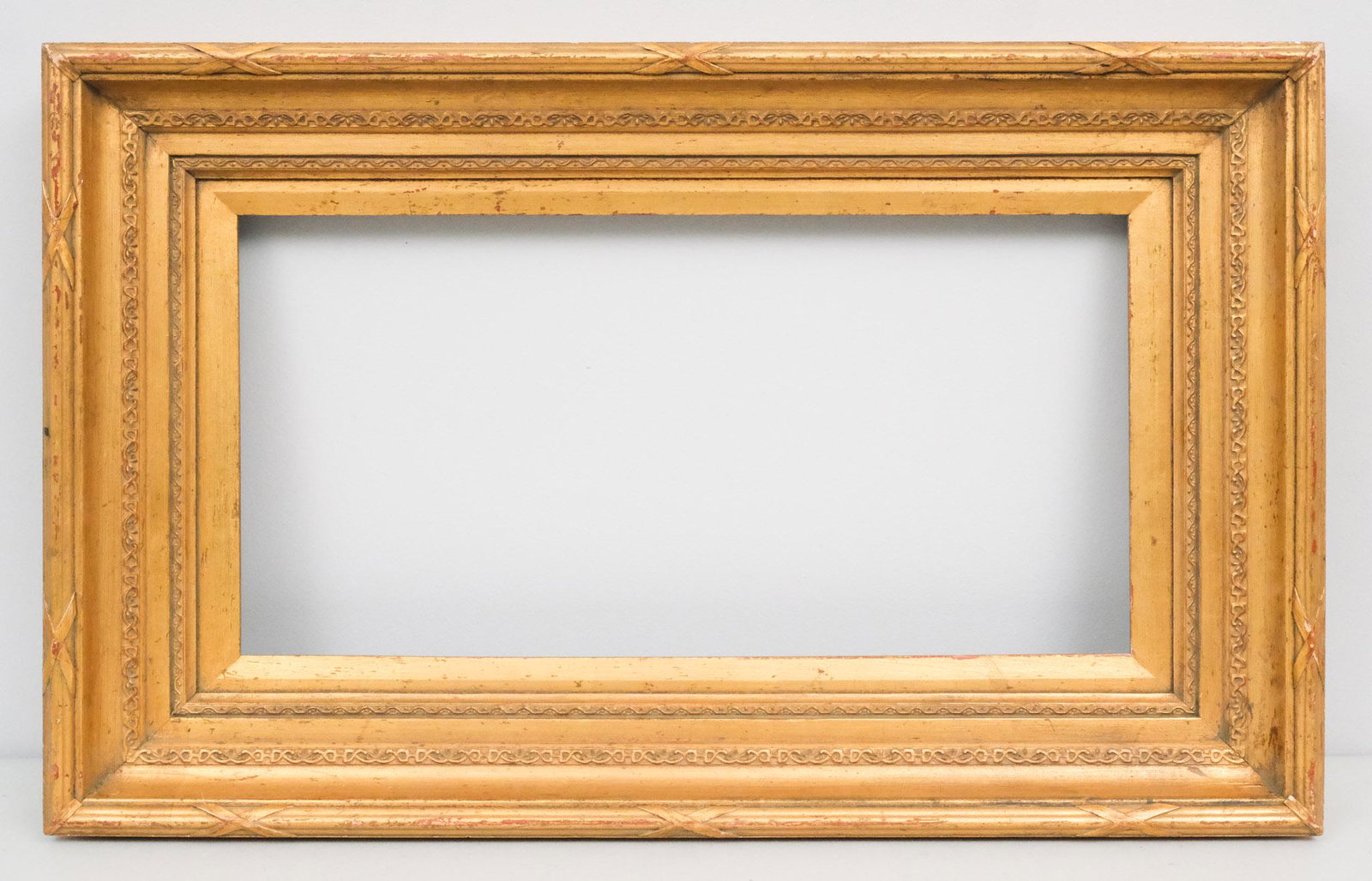 Louis XVI Giltwood Frame: American, 20th century, custom frame in the French style. Overall 20" x 32", Rabbet 12" x 24", Molding 4"