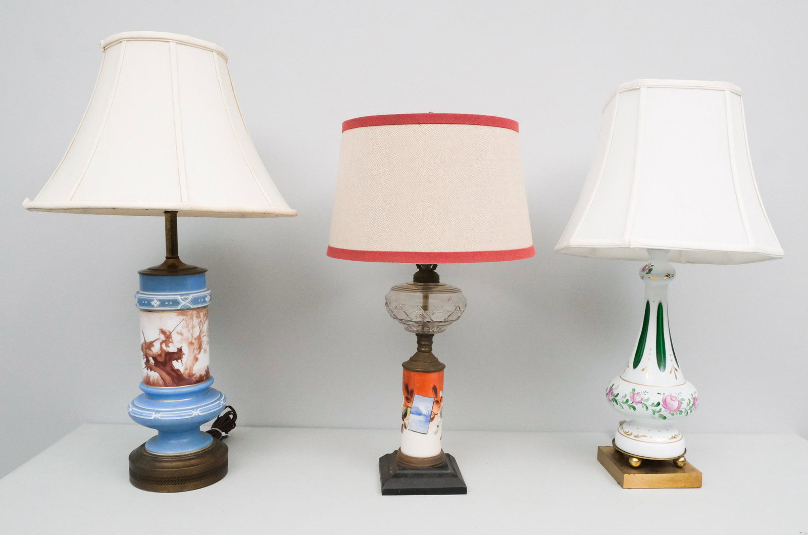 Lot of 3 Antique Painted Cameo Glass Lamps: Variously decorated with landscapes etc. Tallest 29" to finial