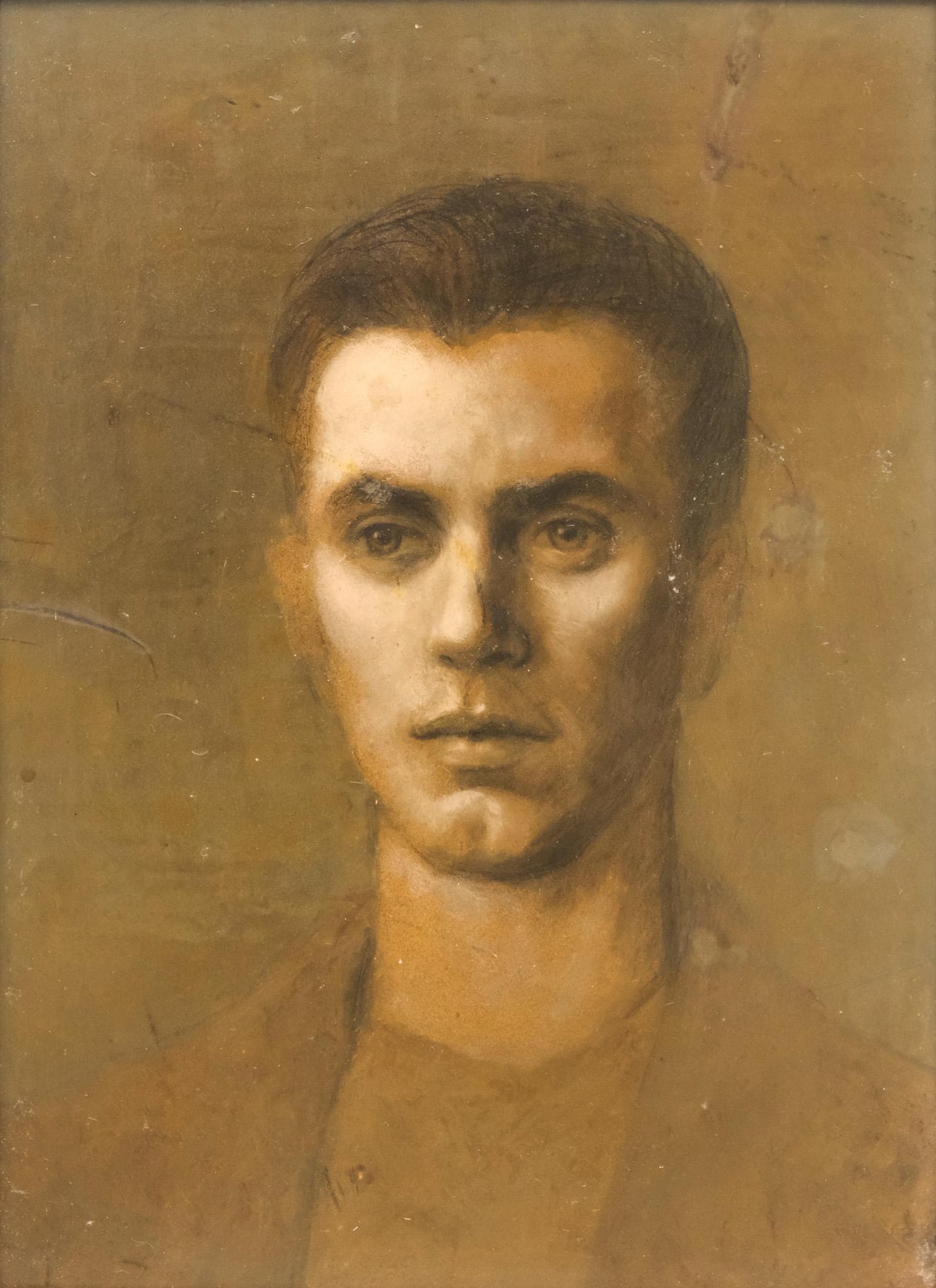 American School, Portrait of a Man: American, early 20th century oil on board depicting a young man with a severe countenance and cleft chin, 12" x 16" board, 13 1/2" x 17 1/2" framed.