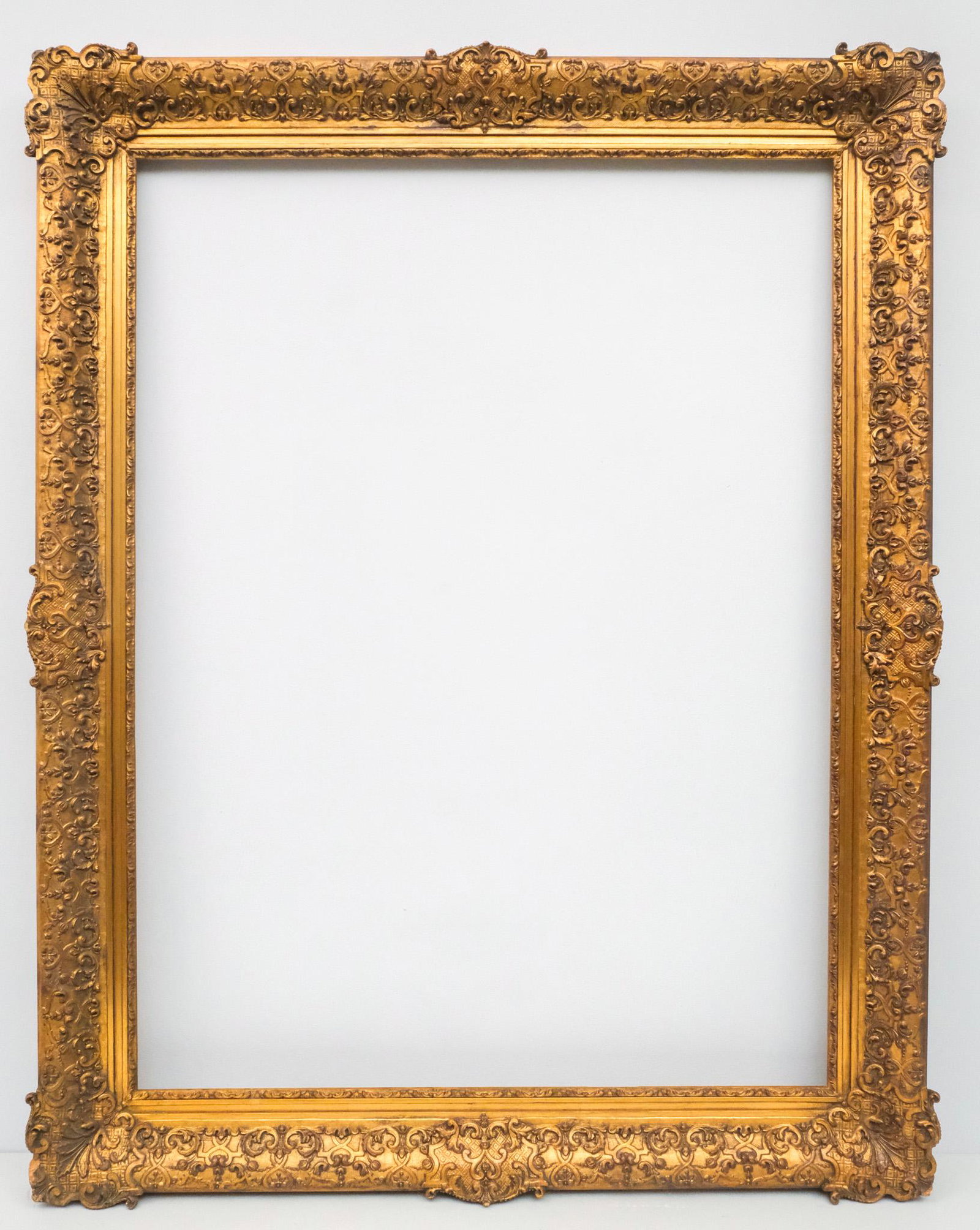 Louis XIV Giltwood Frame: Newcomb Macklin, 20th century, gilded frame in the French style, in a great standard size. Overall 38" x 48", rabbet 30" x 40", molding 4".
