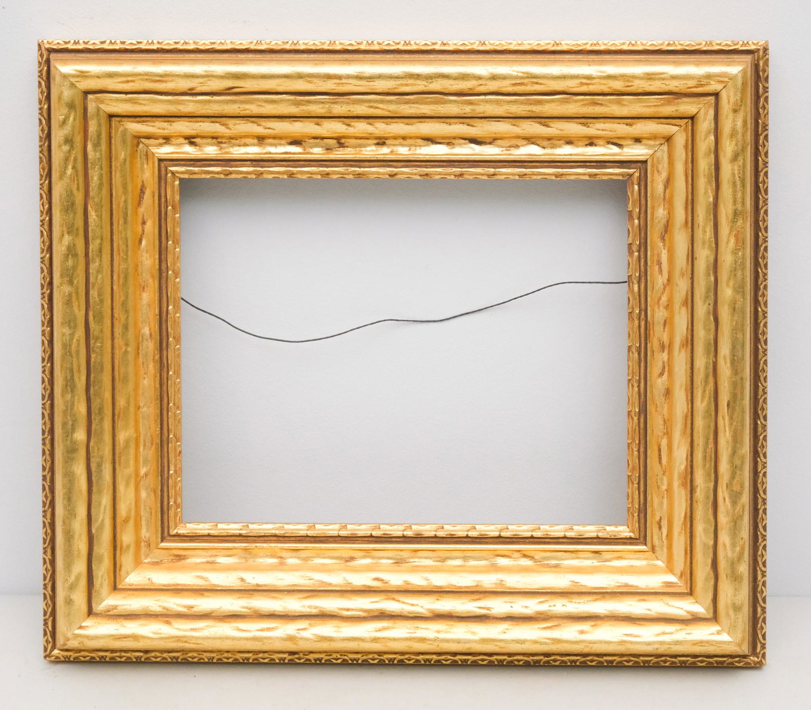 American Arts & Crafts Giltwood Frame: American, 20th century, giltwood frame in great standard size. Overall 13 1/2" x 15 1/2", rabbet 8" x 10", molding 3".