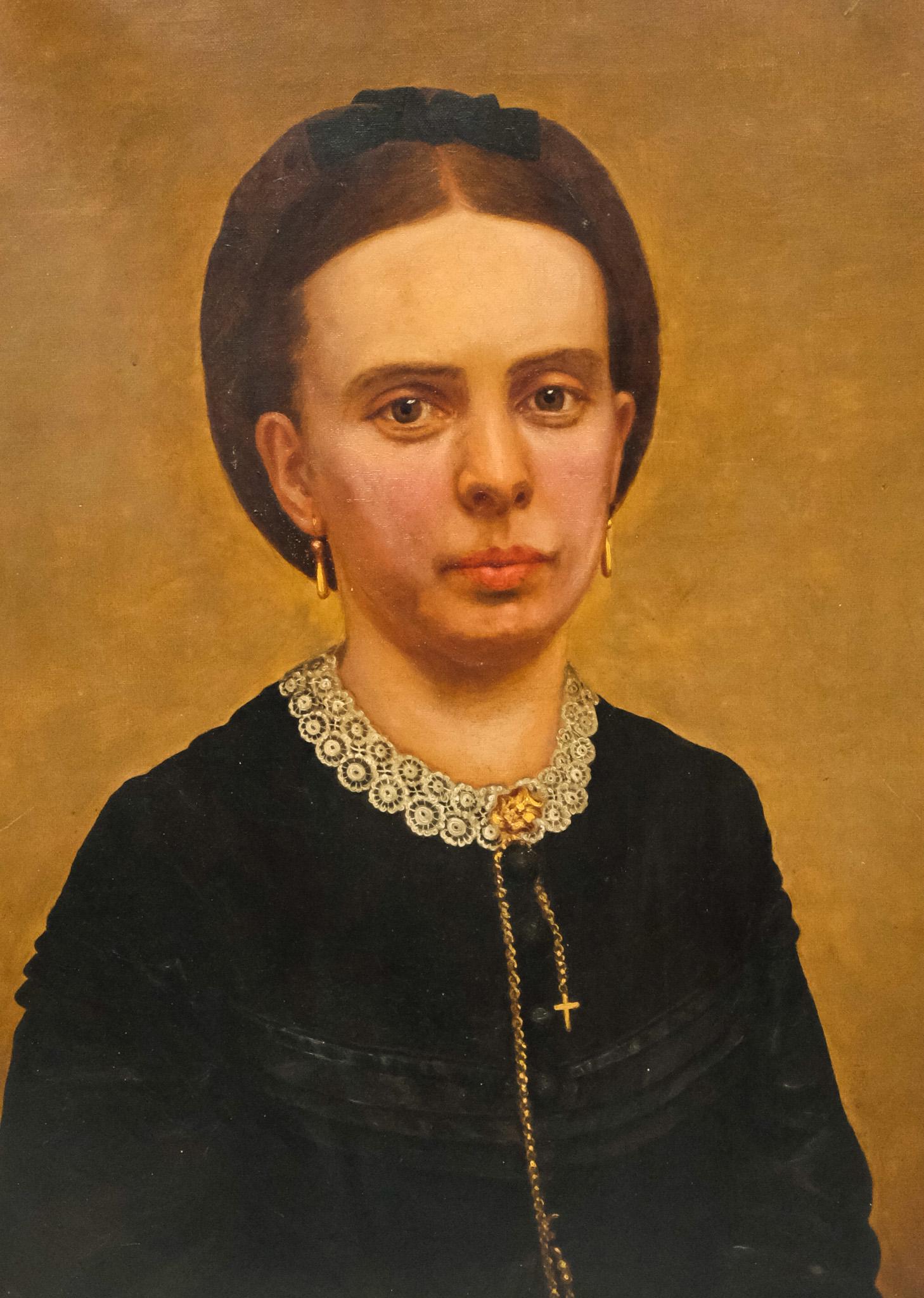 American School, Oval Portrait of a Lady: American, 19th century oil on canvas depicting a woman in modest black dress with lace collar and gold jewelry, 25" x 30" canvas, 27 1/4" x 32" framed.
