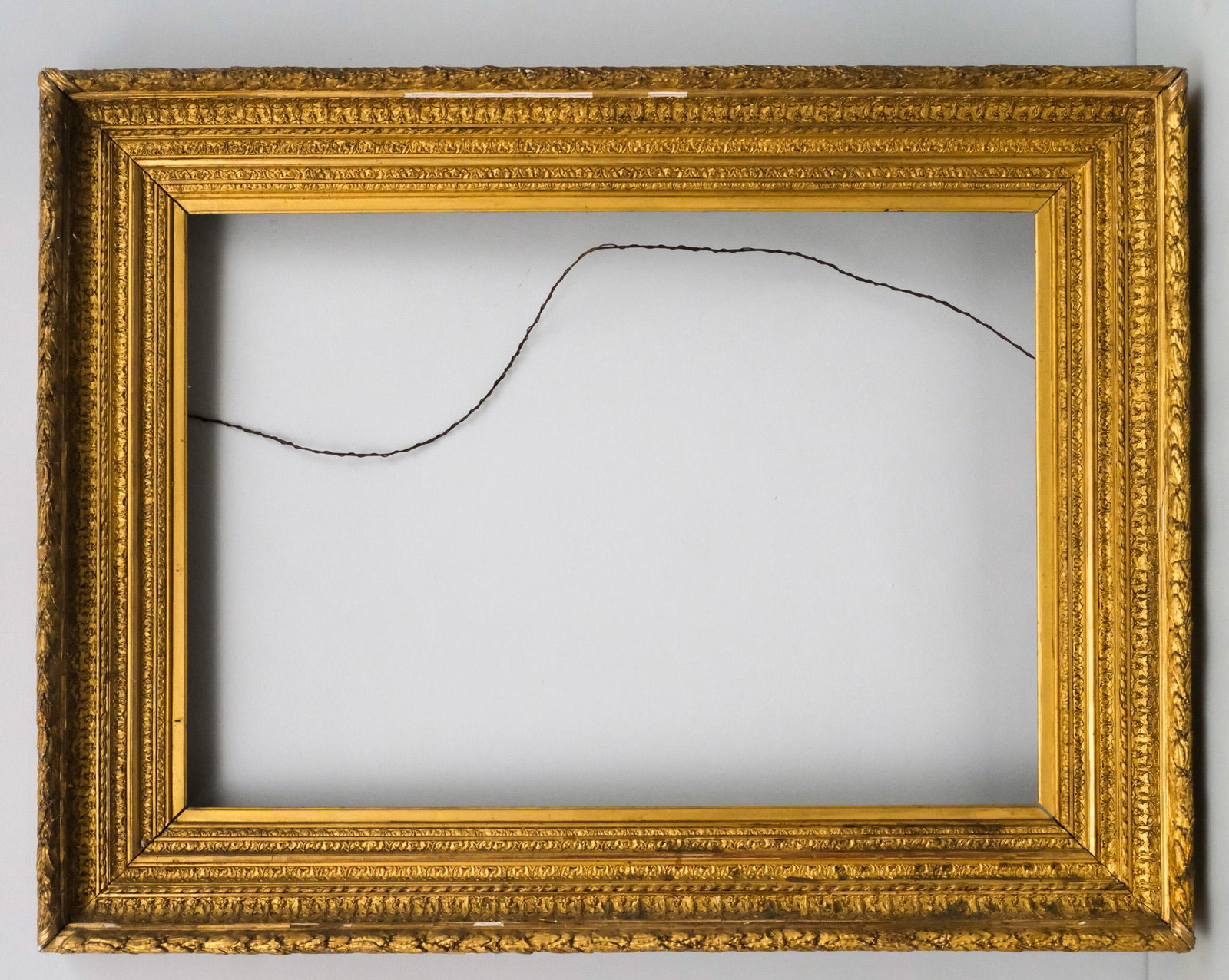 French Salon Giltwood Frame: French, circa 1860, with laurel and berry top edge. Overall 37 1/4" x 48 1/4", rabbet 26" x 37", molding 6".