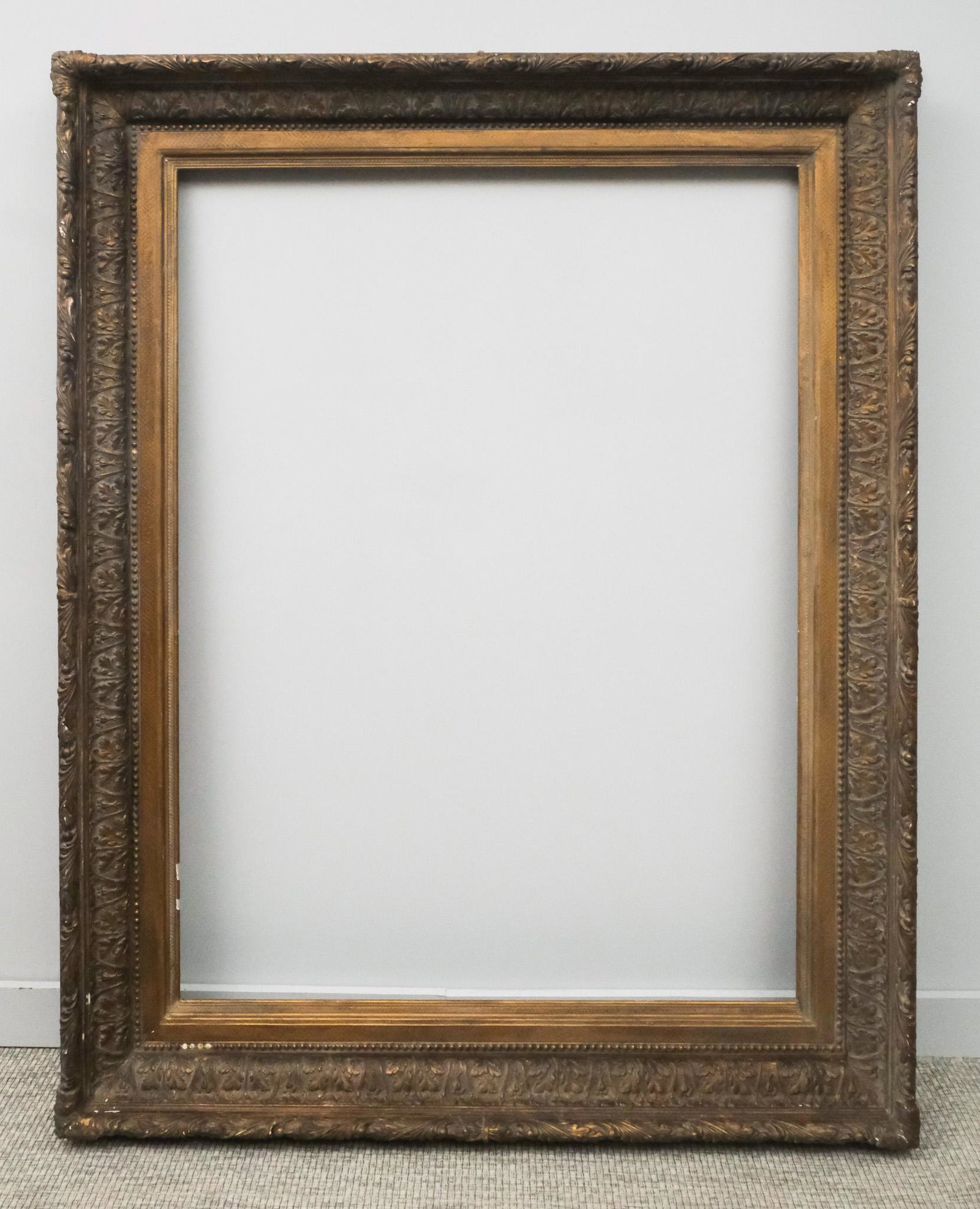 American Hudson River School Gilt Frame: American, ca. 1880, having acanthus ogee and finely incised panel. Overall 53 1/2" x 67", rabbet 40" x 53", molding 7 1/2".