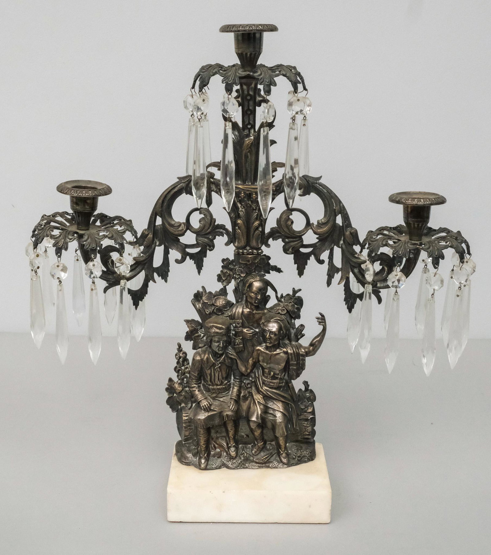Cornelius & Co. Daniel Boone Girandole: Well cast on white marble base. Marked as shown. 17 x 17 3/4.